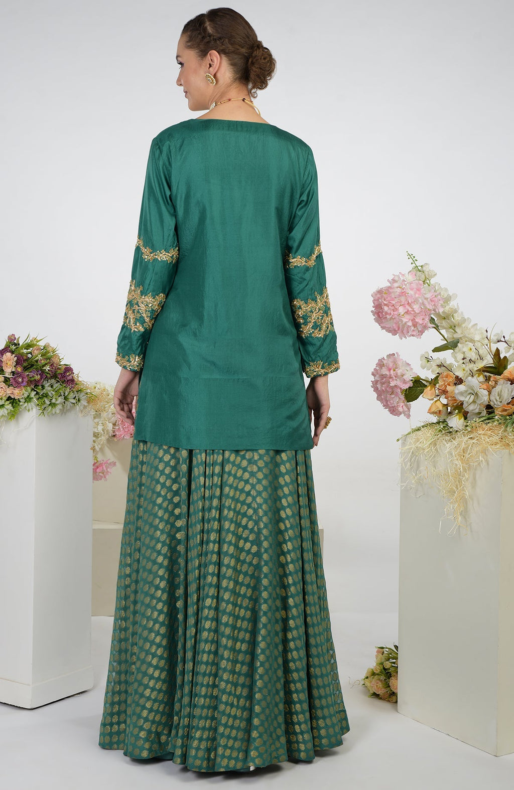 Bottle green Banarasi zardozi kalidaar skirt set with gold embroidery.