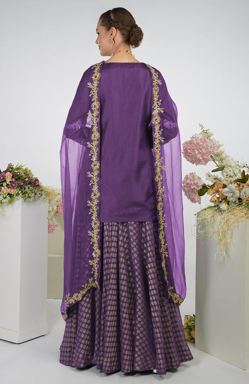 Amethyst Banarasi Zardozi Kalidaar Skirt Set with a short tunic and dupatta.