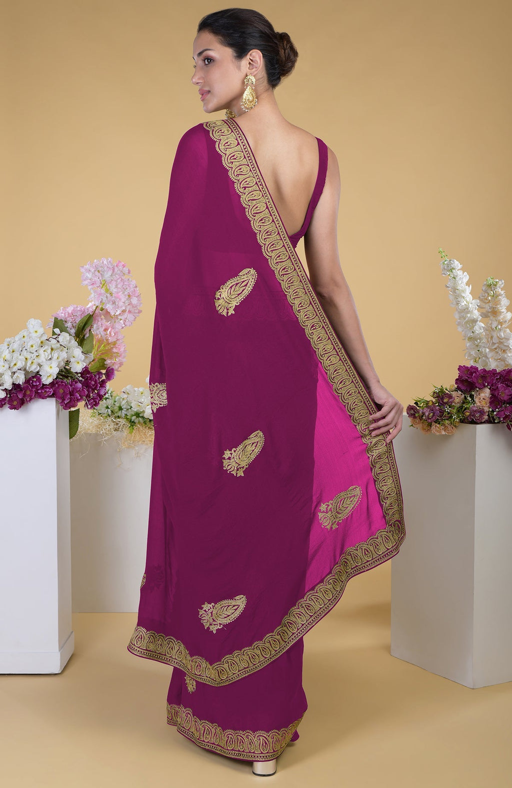 Peacock pink-gold Kashmiri tilla aari embroidered saree with paisley motifs.