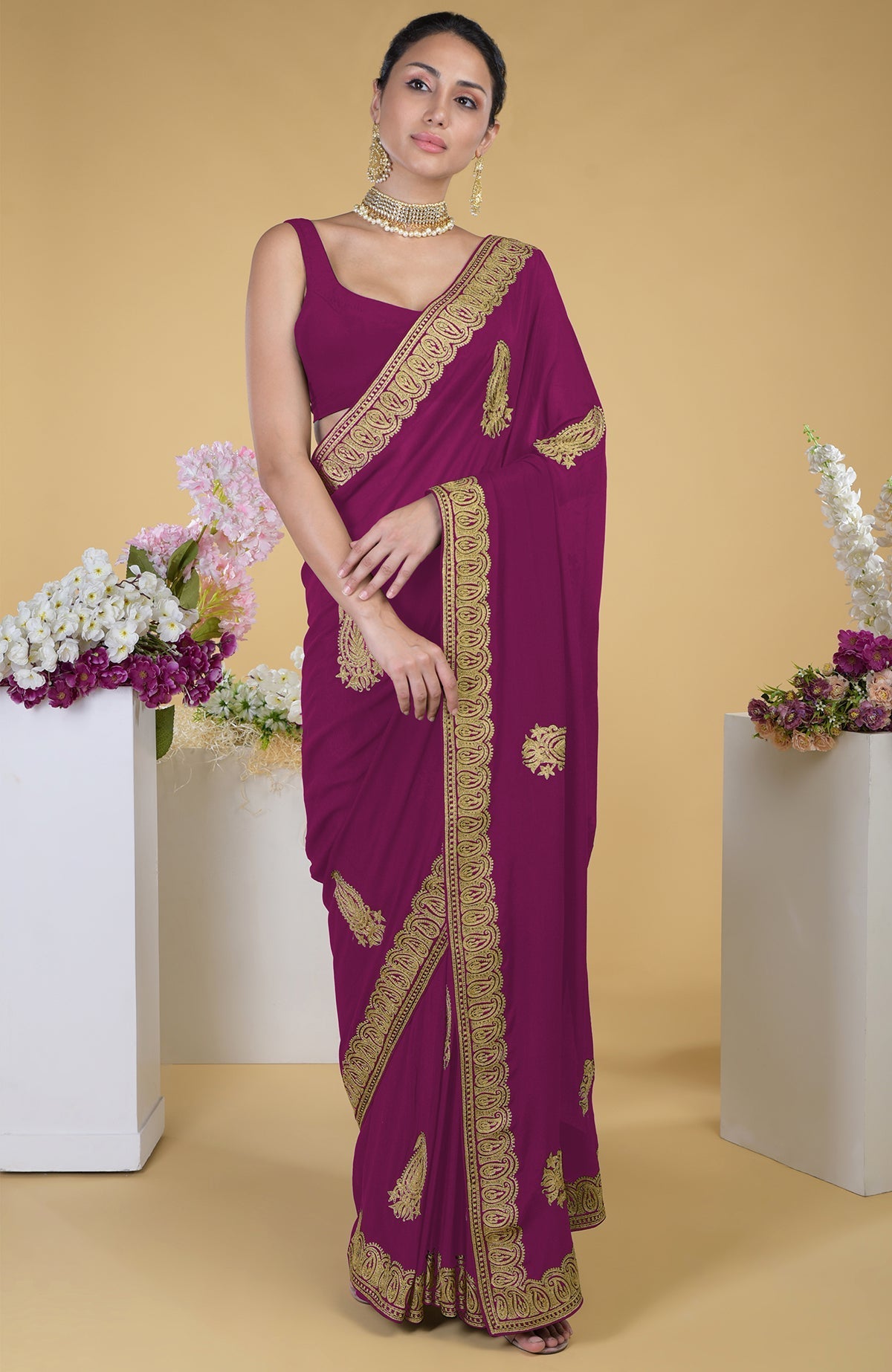 Pewter-gold Kashmiri Tilla Aari embroidered saree with gold paisley patterns.