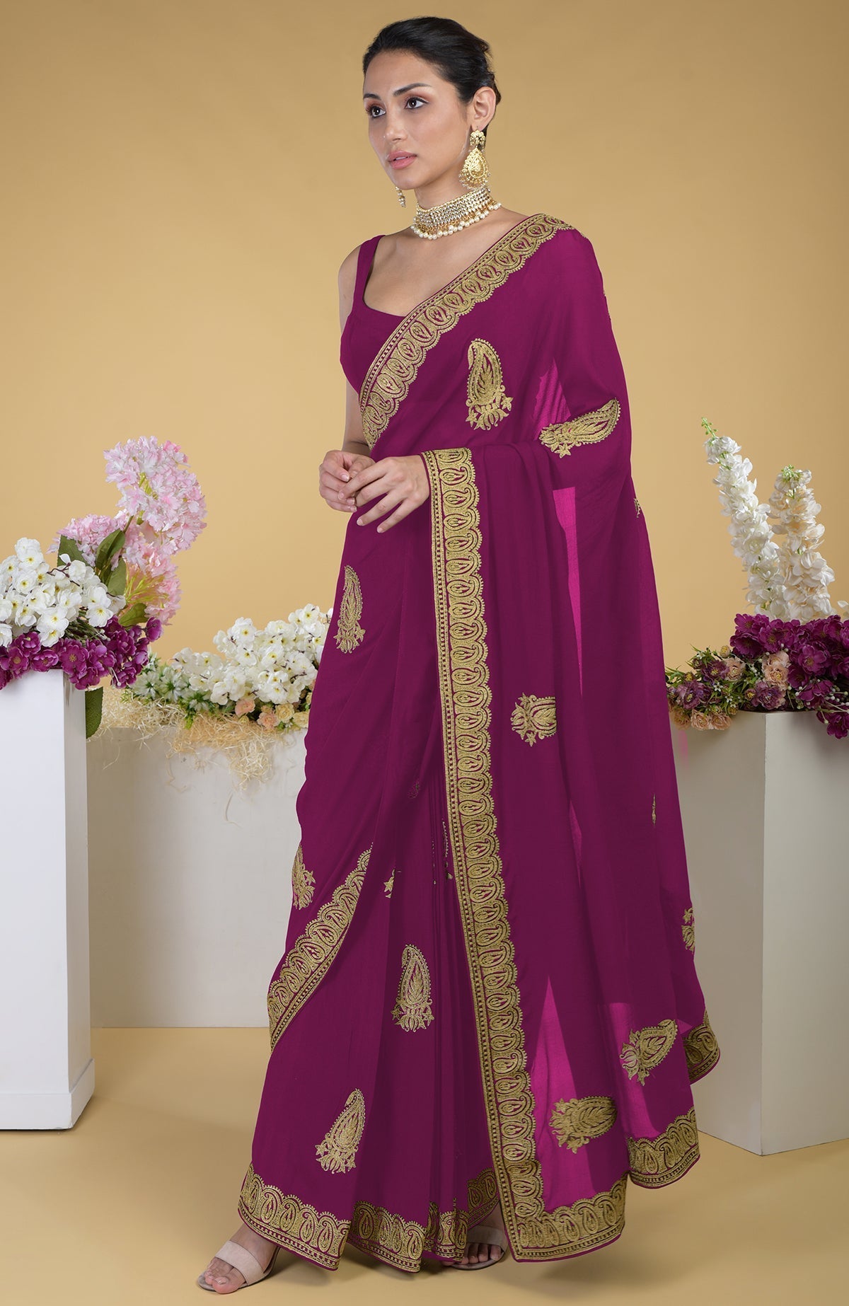 Peacock pink-gold Kashmiri Tilla Aari embroidered saree with paisley motifs.