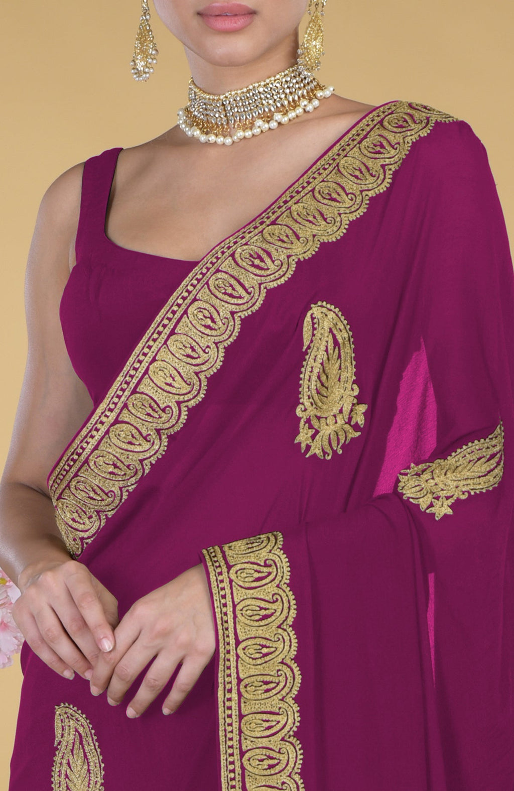Peacock pink georgette saree with gold paisley Kashmiri tilla aari embroidery.