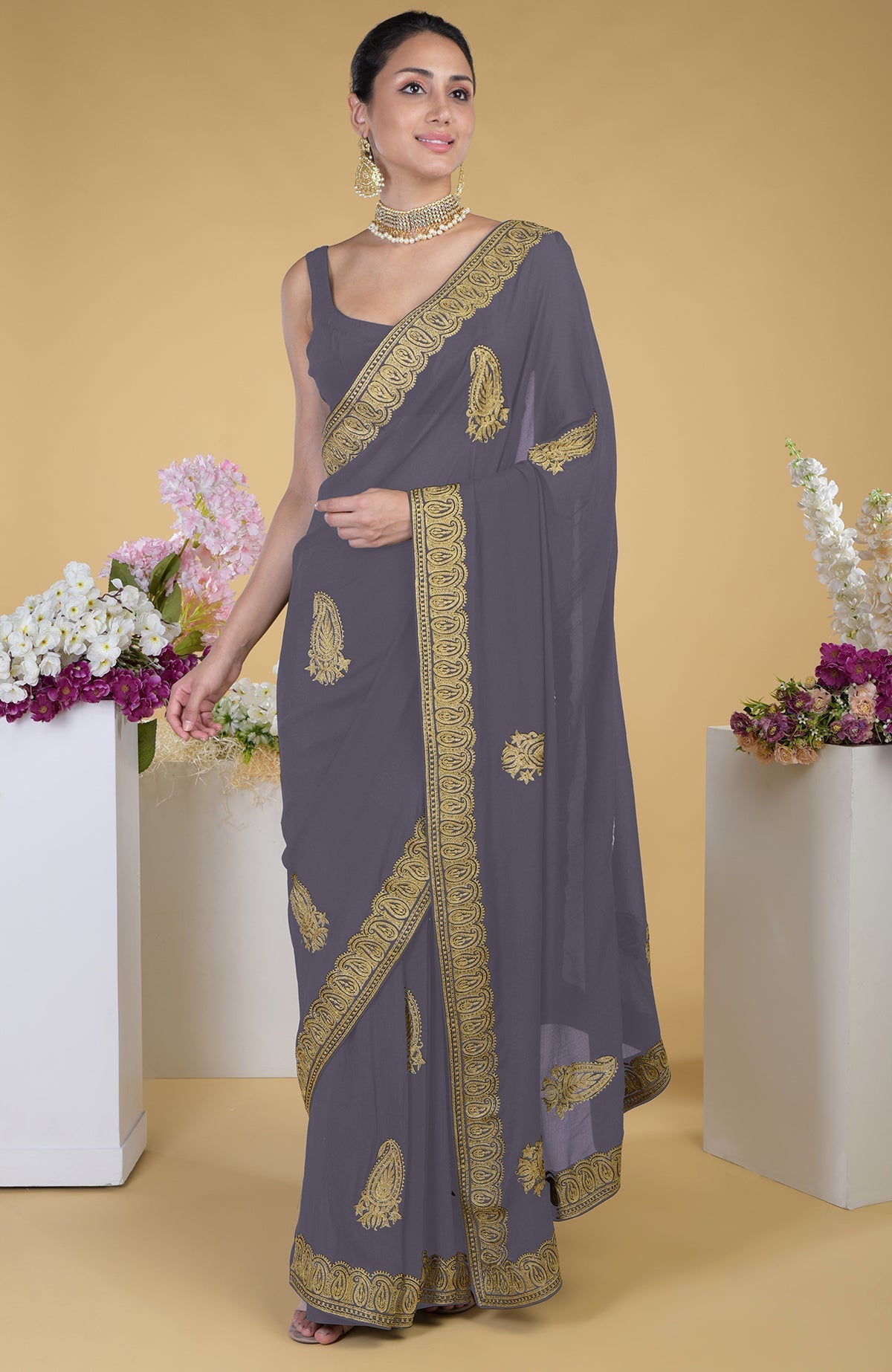 Pewter-gold Kashmiri tilla aari embroidered saree with paisley motifs.