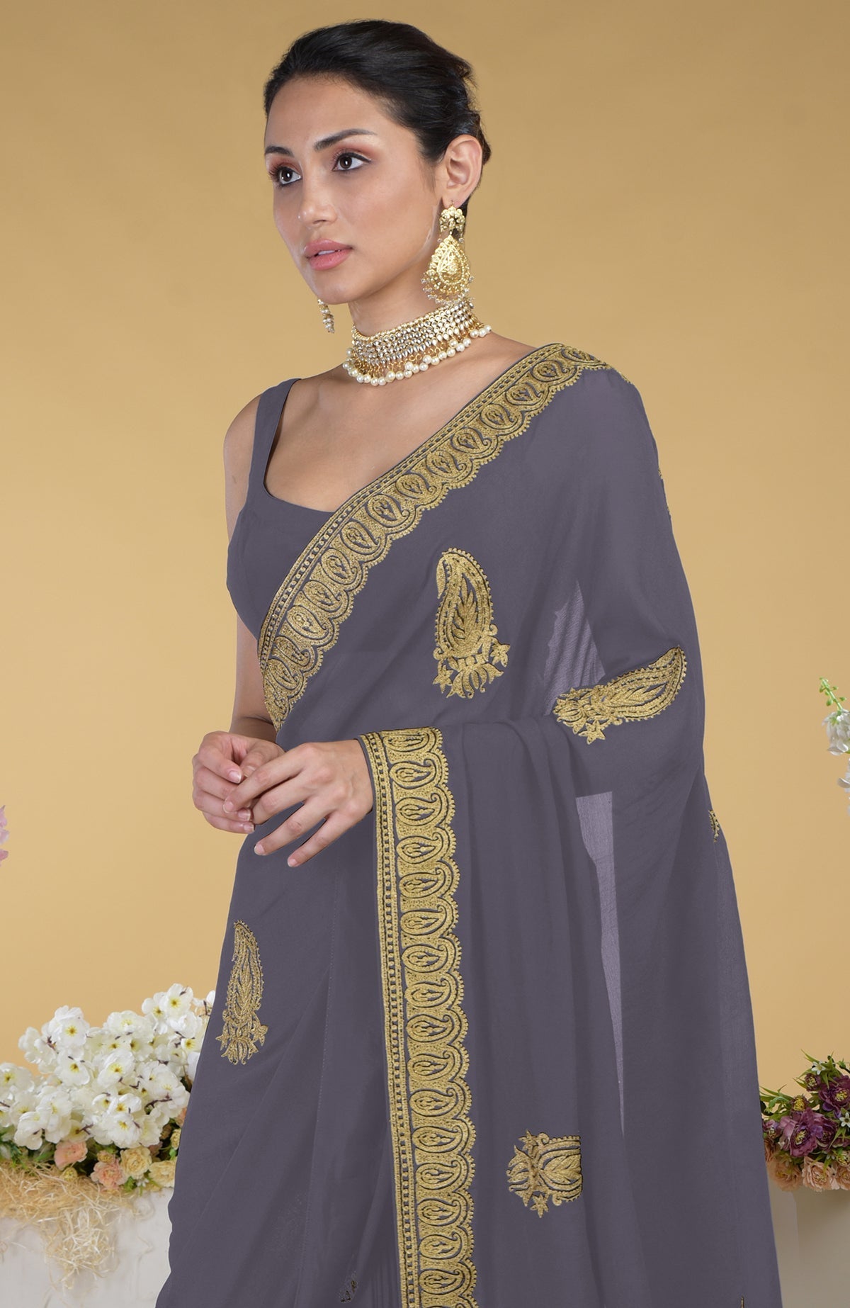 Pewter-gold Kashmiri tilla aari embroidered saree with paisley motifs.