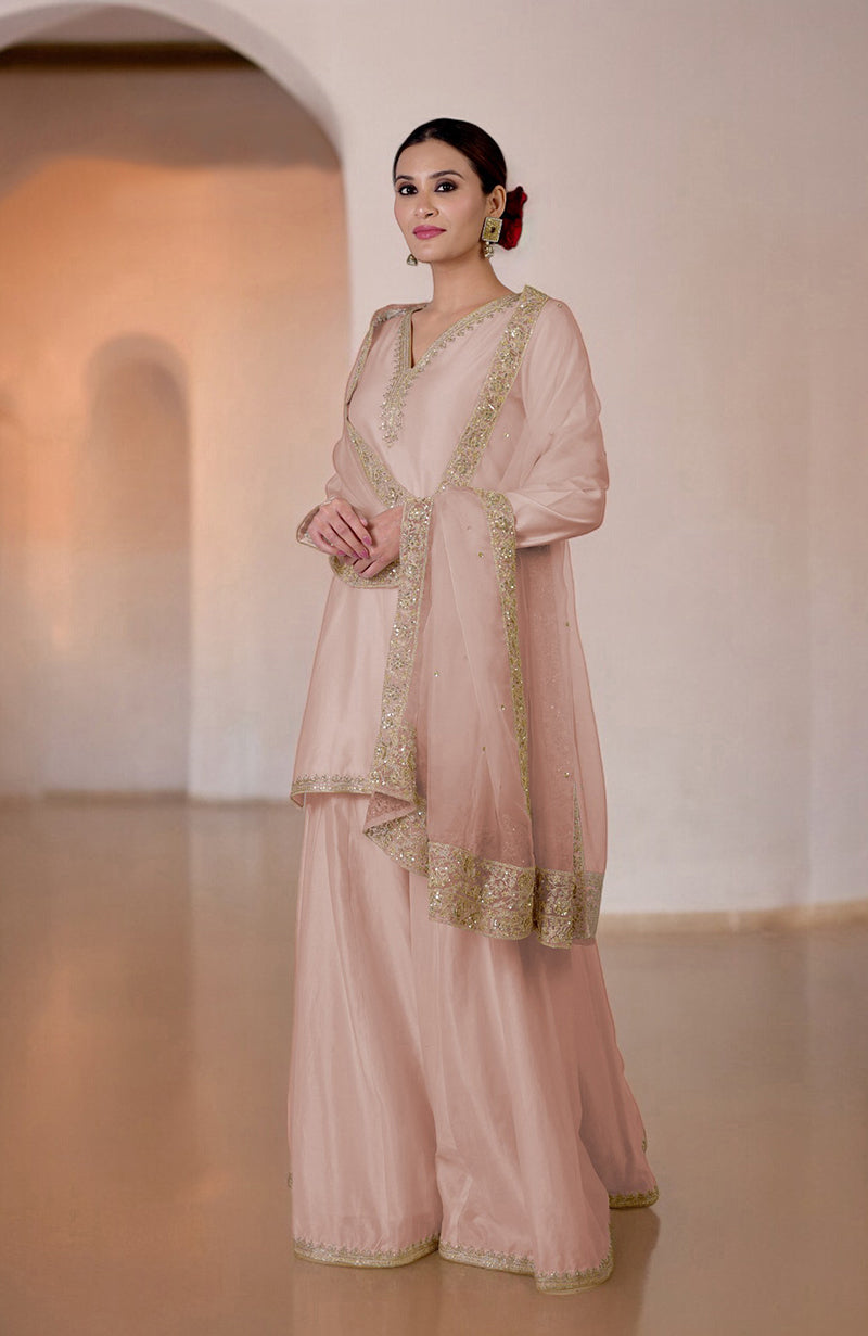 Ivory Marori & Zardozi Hand Embroidered Sharara Set with a matching dupatta.