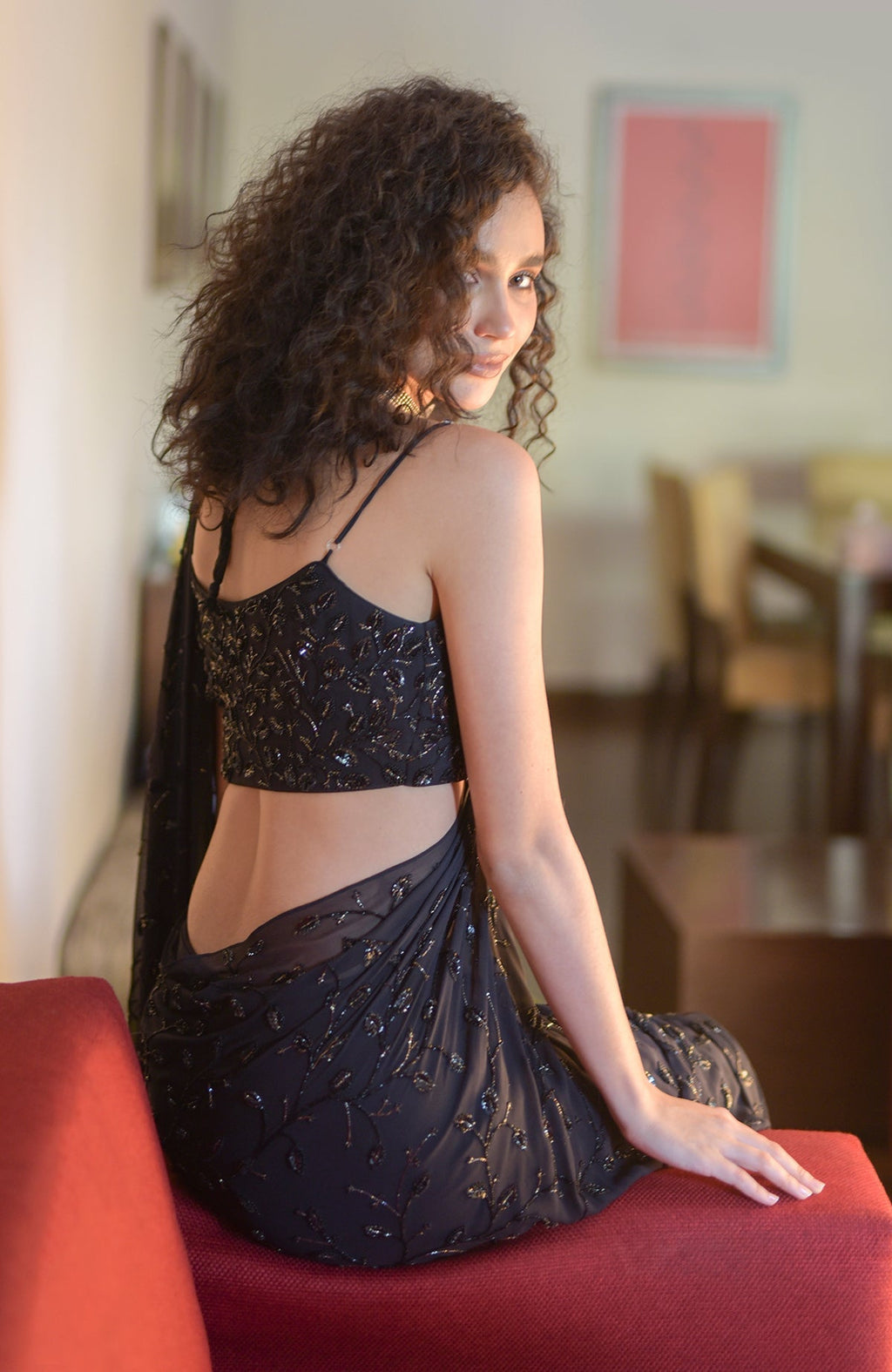 Black mermaid cut gown saree with hand beaded floral embroidery and pleated pallav drape