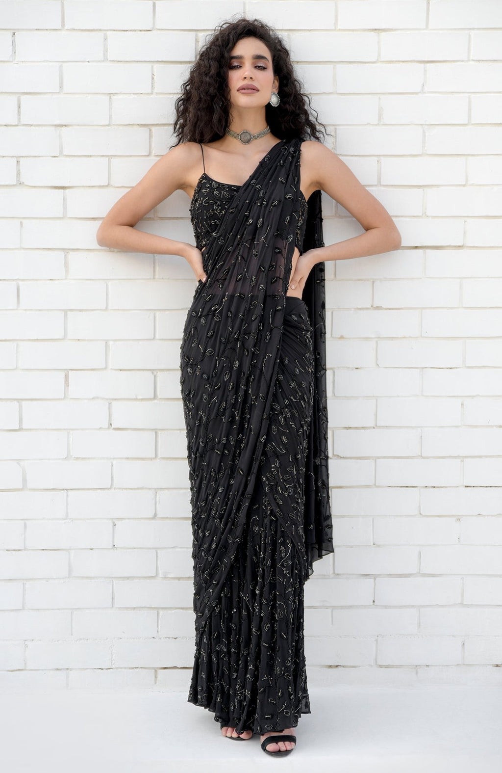 Black mermaid cut gown saree with hand beaded floral embroidery and pleated pallav drape