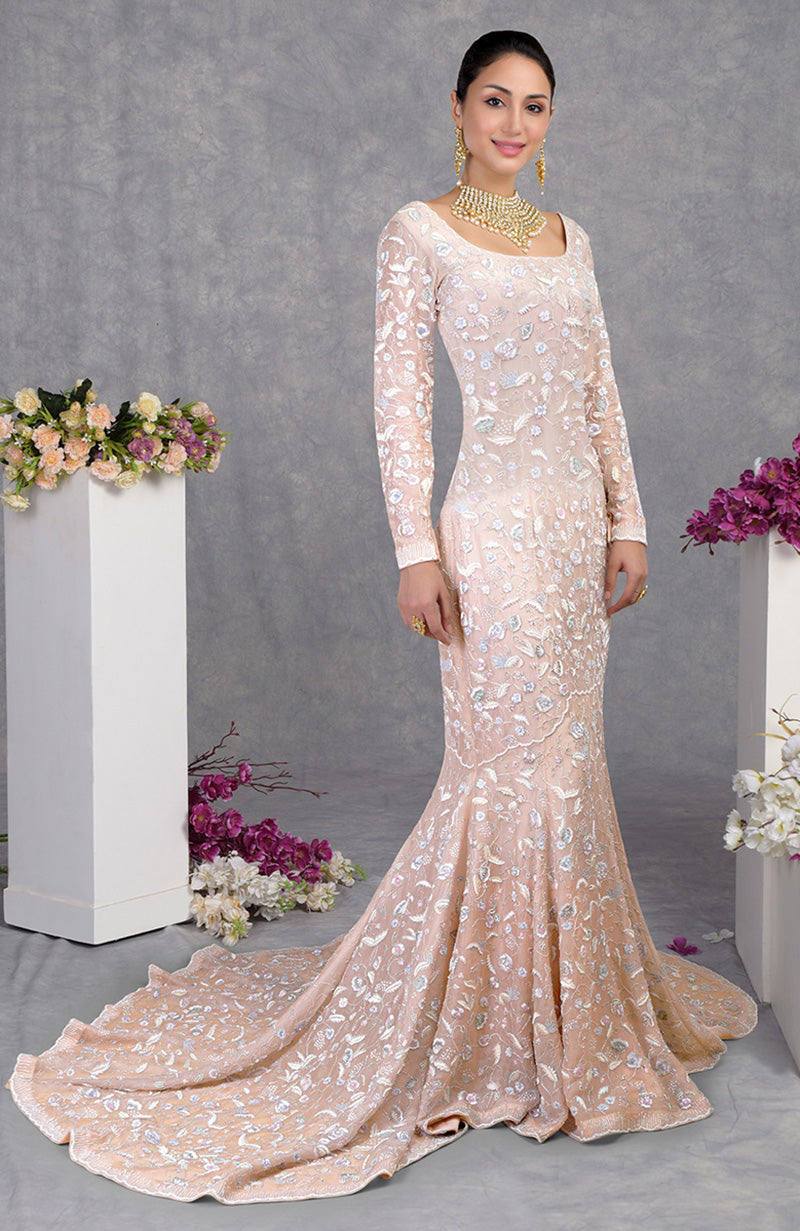 Fishcut gown in pastel shades with hand-embroidered floral beads and pearls on silk organza.
