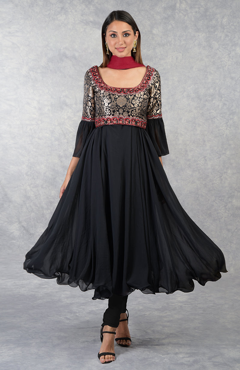 Black Anarkali set with gold brocade yoke and black red bead embroidery, paired with churidar and red dupatta