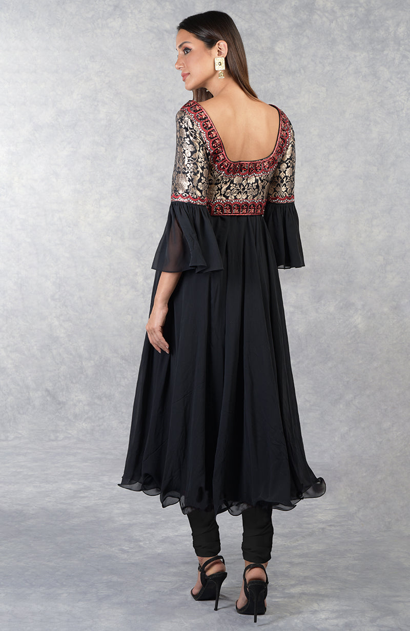 Black Anarkali set with gold brocade yoke, black and red bead embroidery, and red tulle dupatta