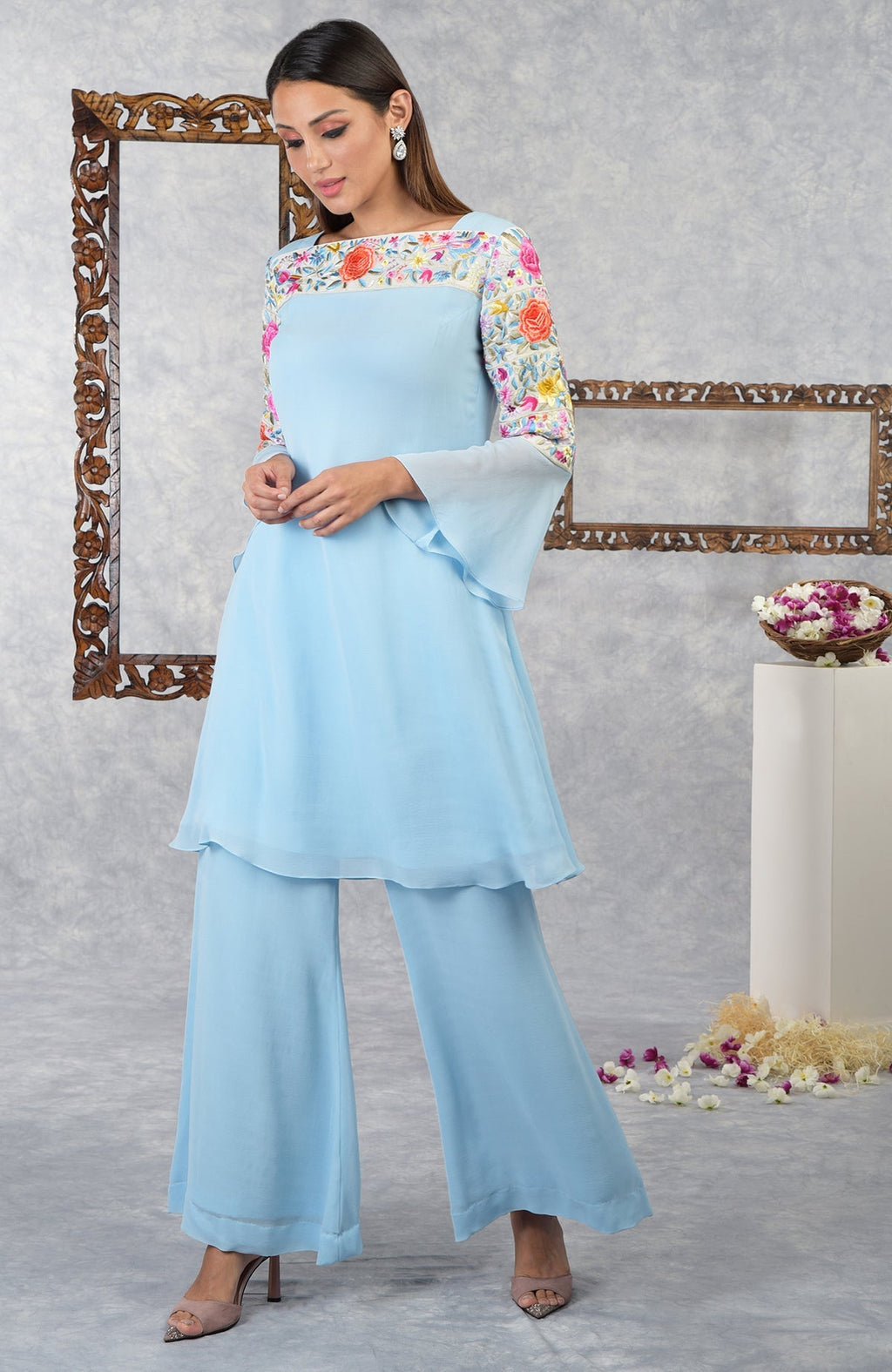 Cerulean blue Parsi Gara embroidered kurta set with bell sleeves and palazzo pants.