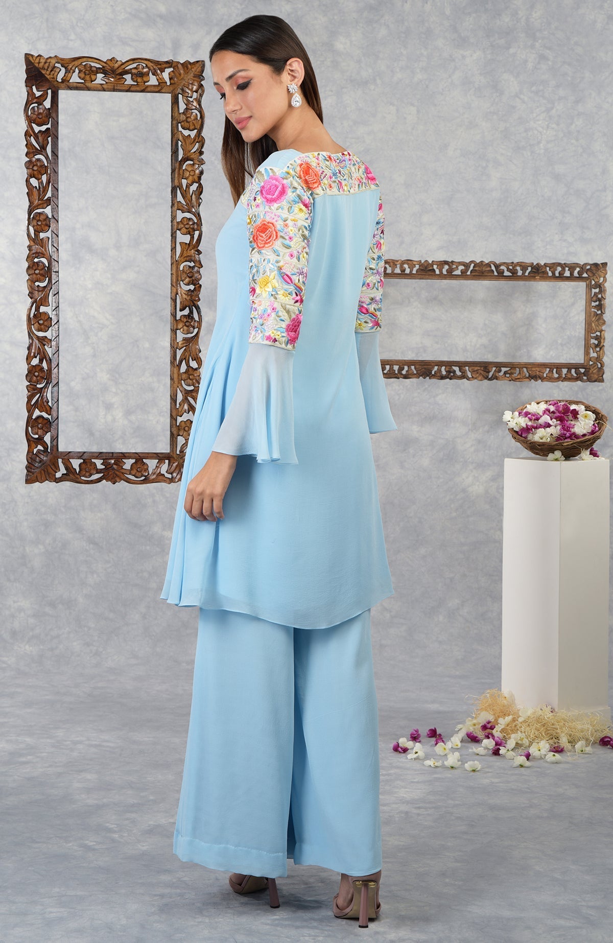 Cerulean blue Parsi Gara embroidered kurta set with bell sleeves and wide-leg pants.