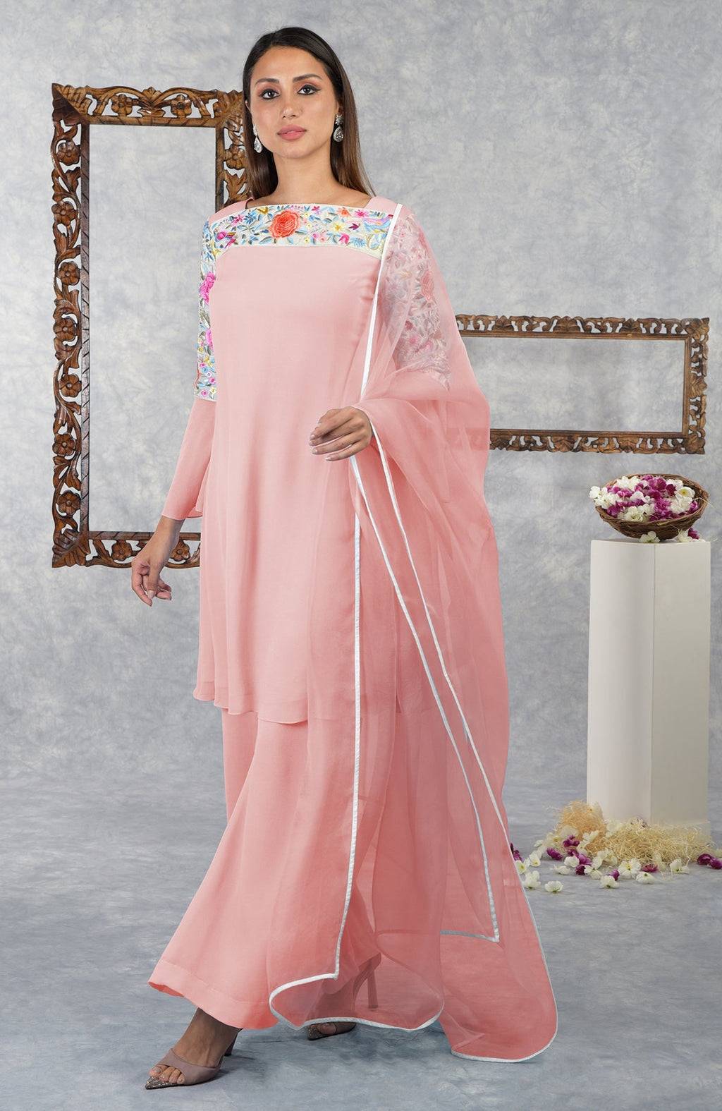 Impatiens pink Parsi Gara embroidered kurta set with a sheer dupatta.