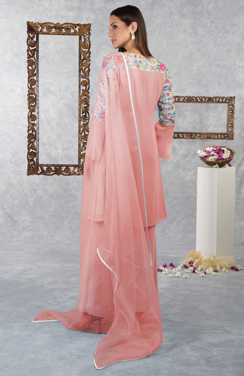 Impatiens pink Parsi Gara embroidered kurta set with a sheer dupatta.