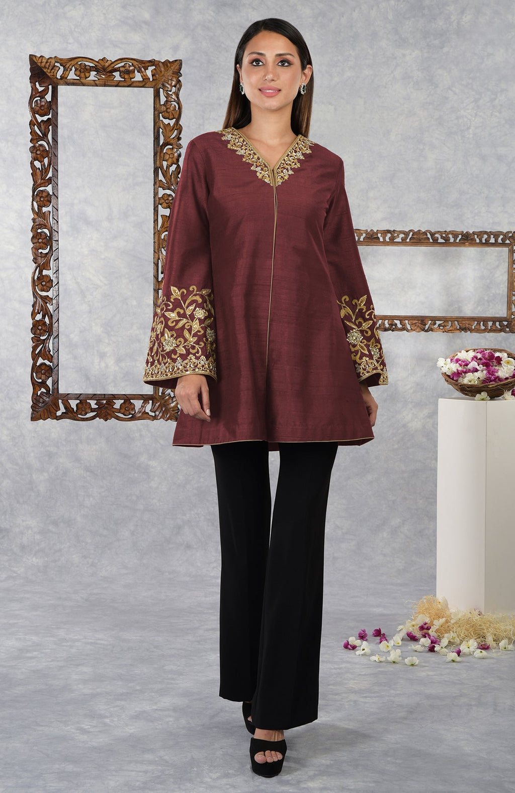 Pomegranate raw silk hand-embroidered jacket with black pants.