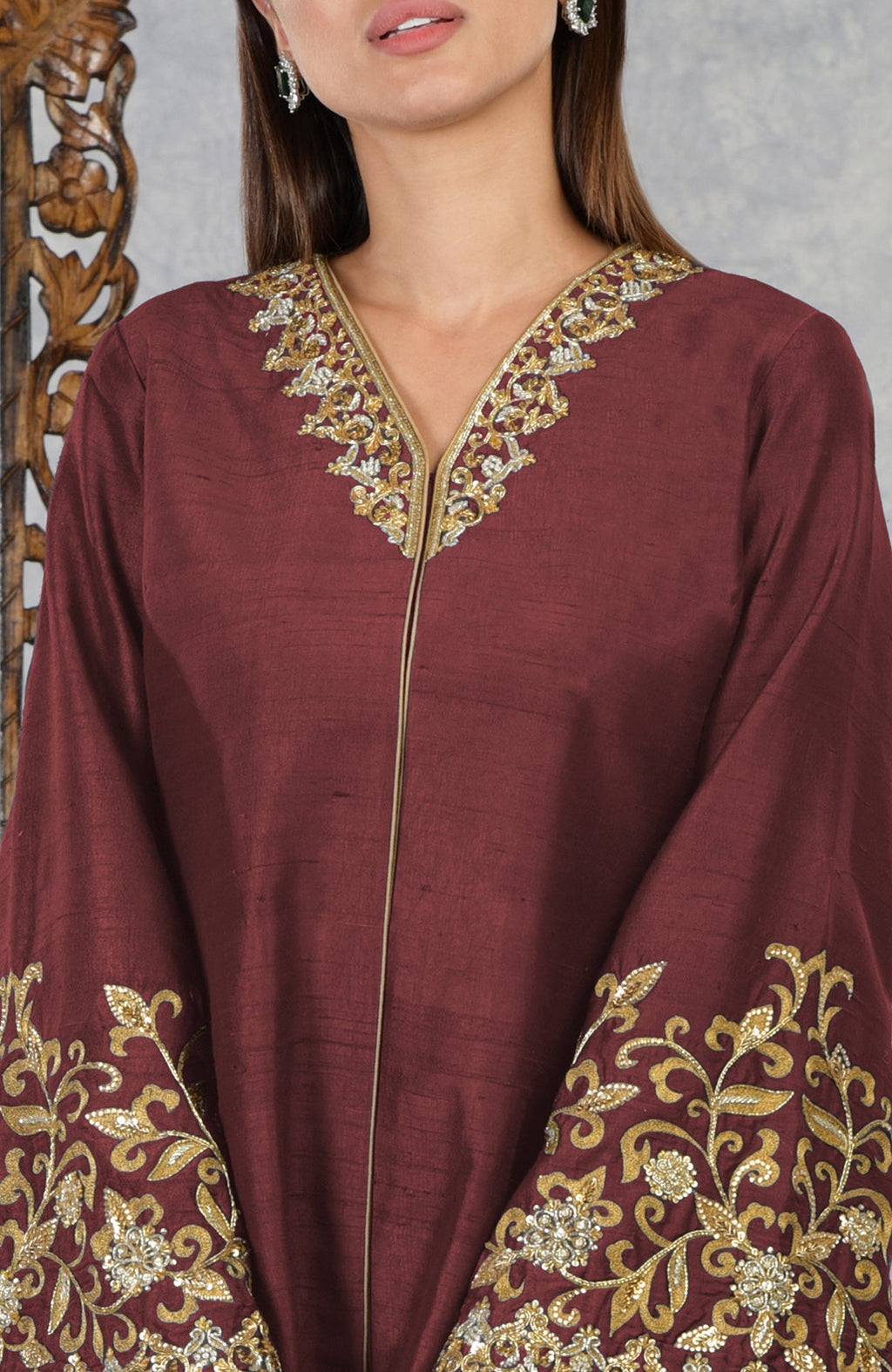 Pomegranate raw silk jacket with gold and silver hand embroidery on the neckline and sleeves.