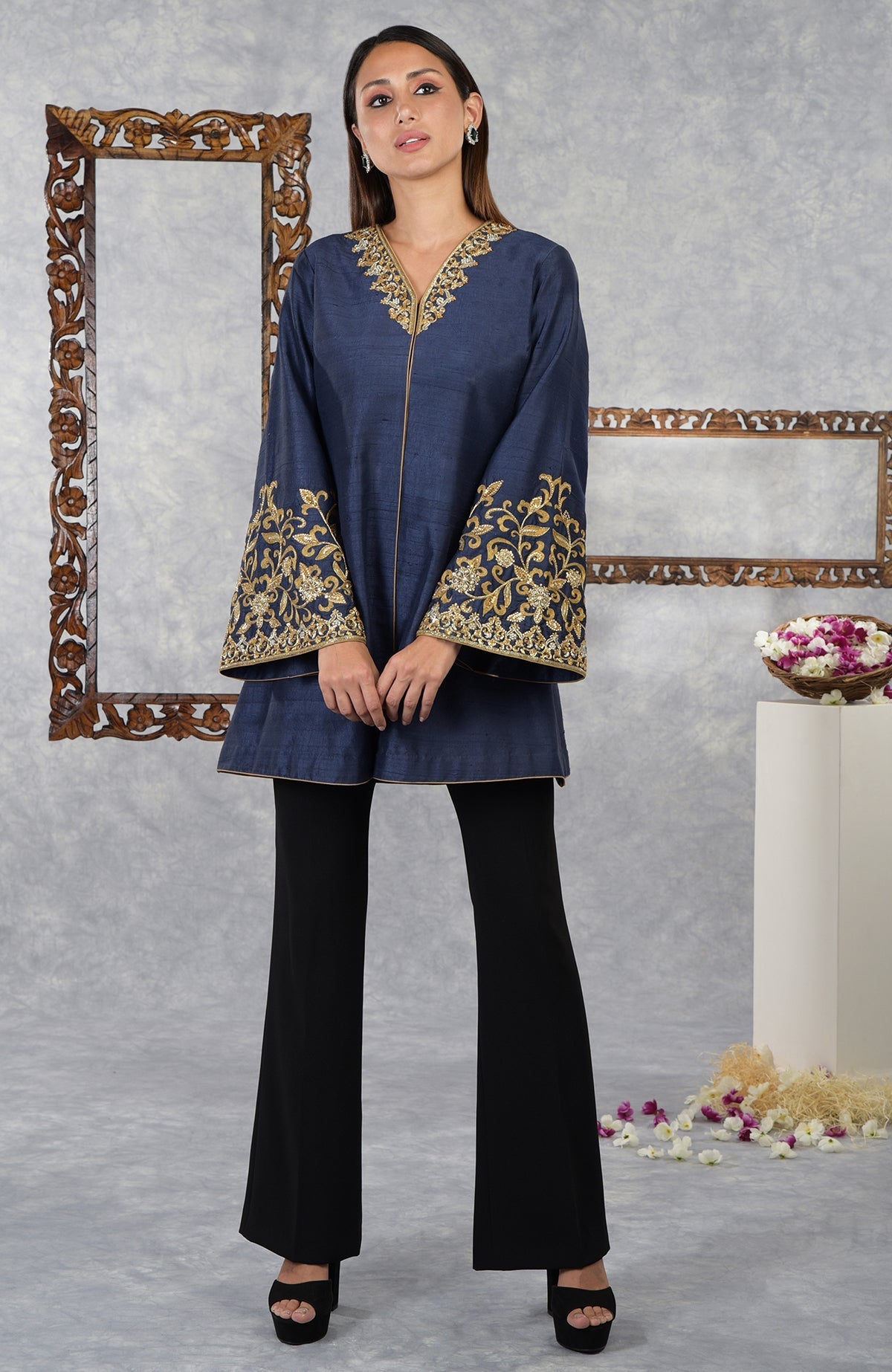 Mood Indigo Raw Silk Hand Embroidered Jacket with black pants.