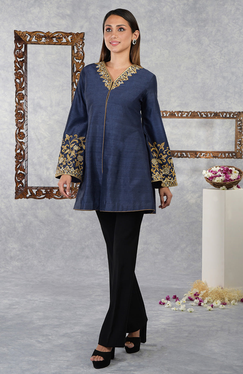 Mood Indigo raw silk hand-embroidered jacket with high-waisted flared pants.