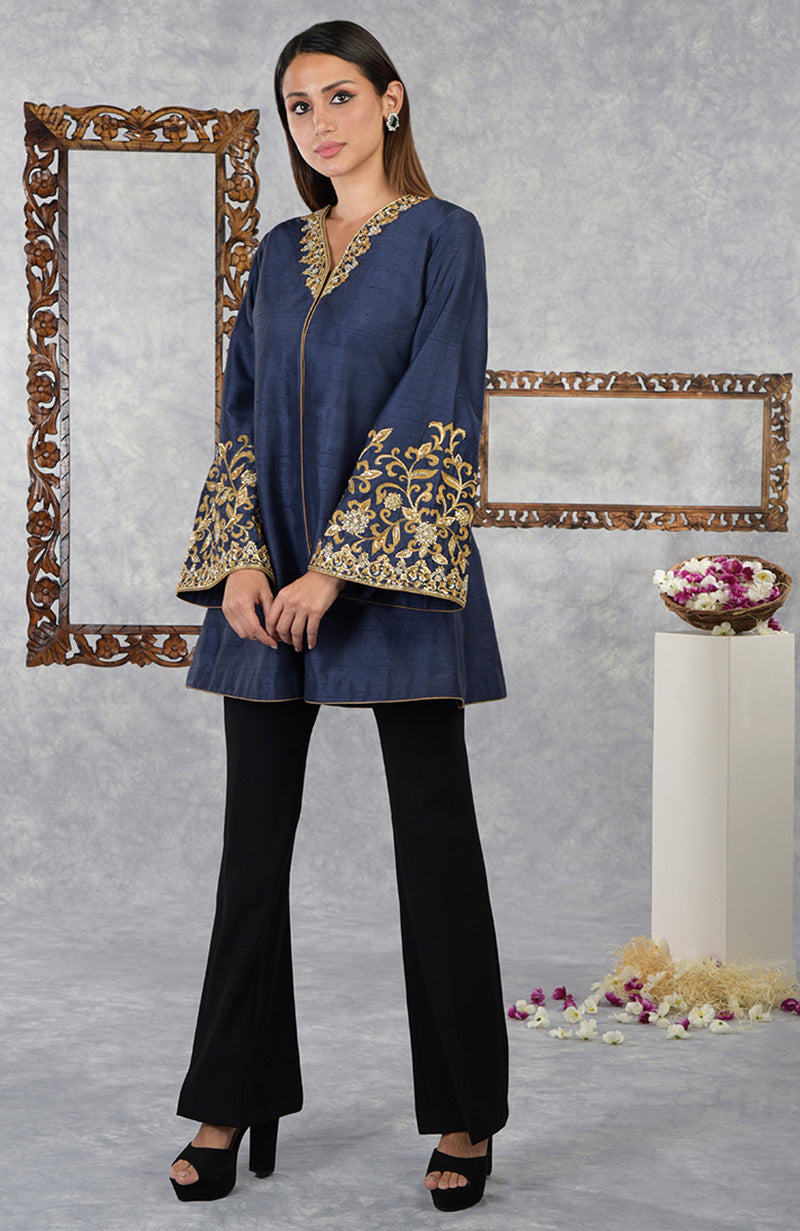 Mood Indigo raw silk hand-embroidered jacket with high-waisted flared pants.