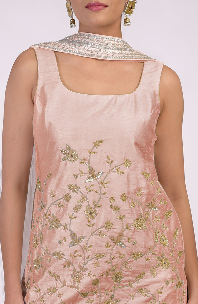 A rose gold sleeveless kurta with intricate gold and silver floral embroidery.