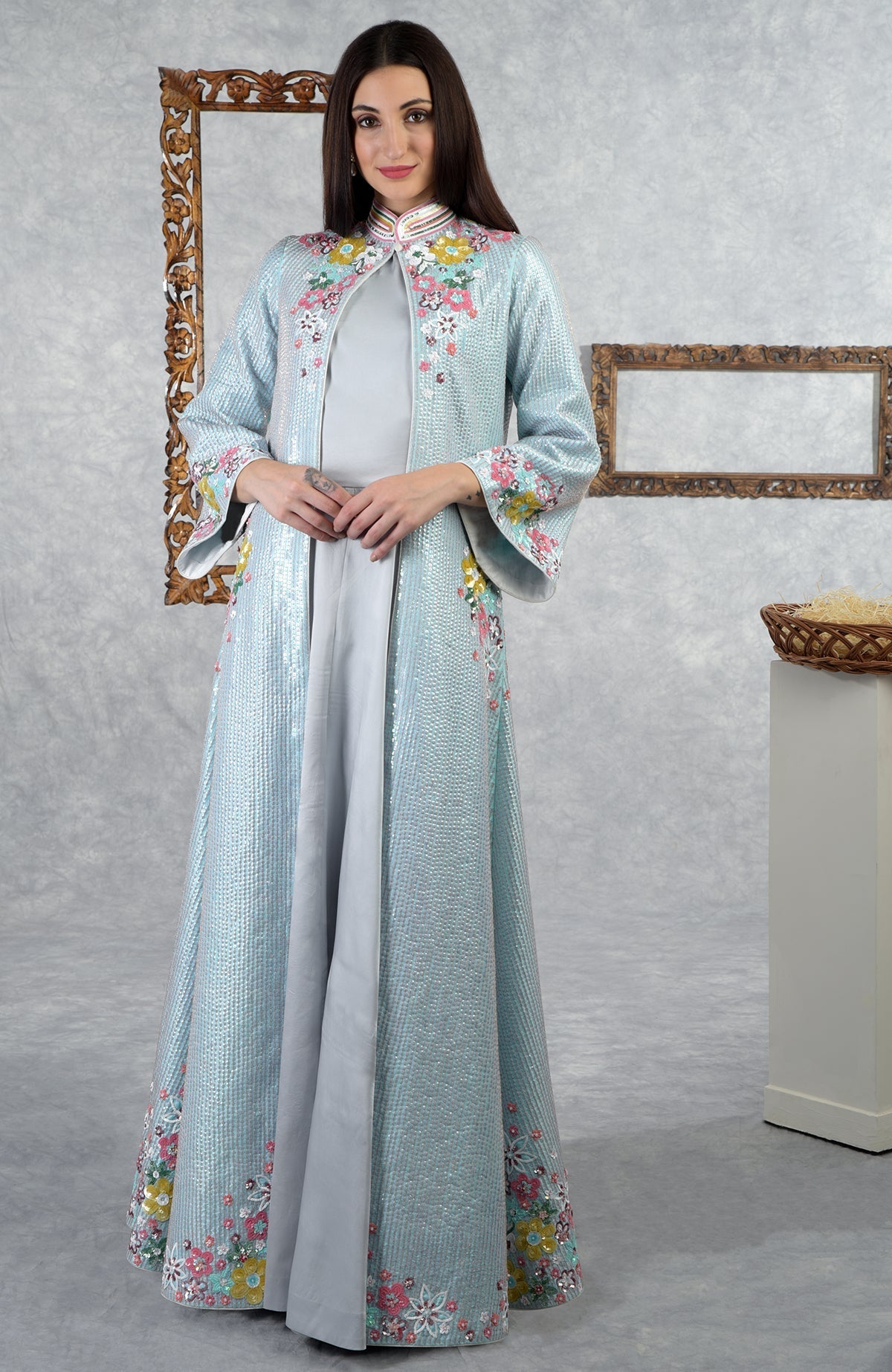 Aqua-grey sequin hand-embroidered jacket set with floral details and a dusty blue dress.