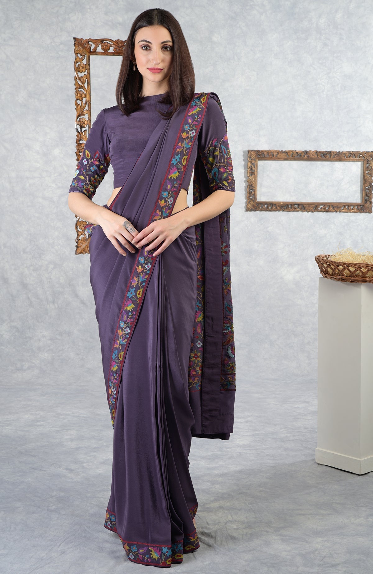Model wears an eclipse Kashmir Kani art embroidered saree with blouse.