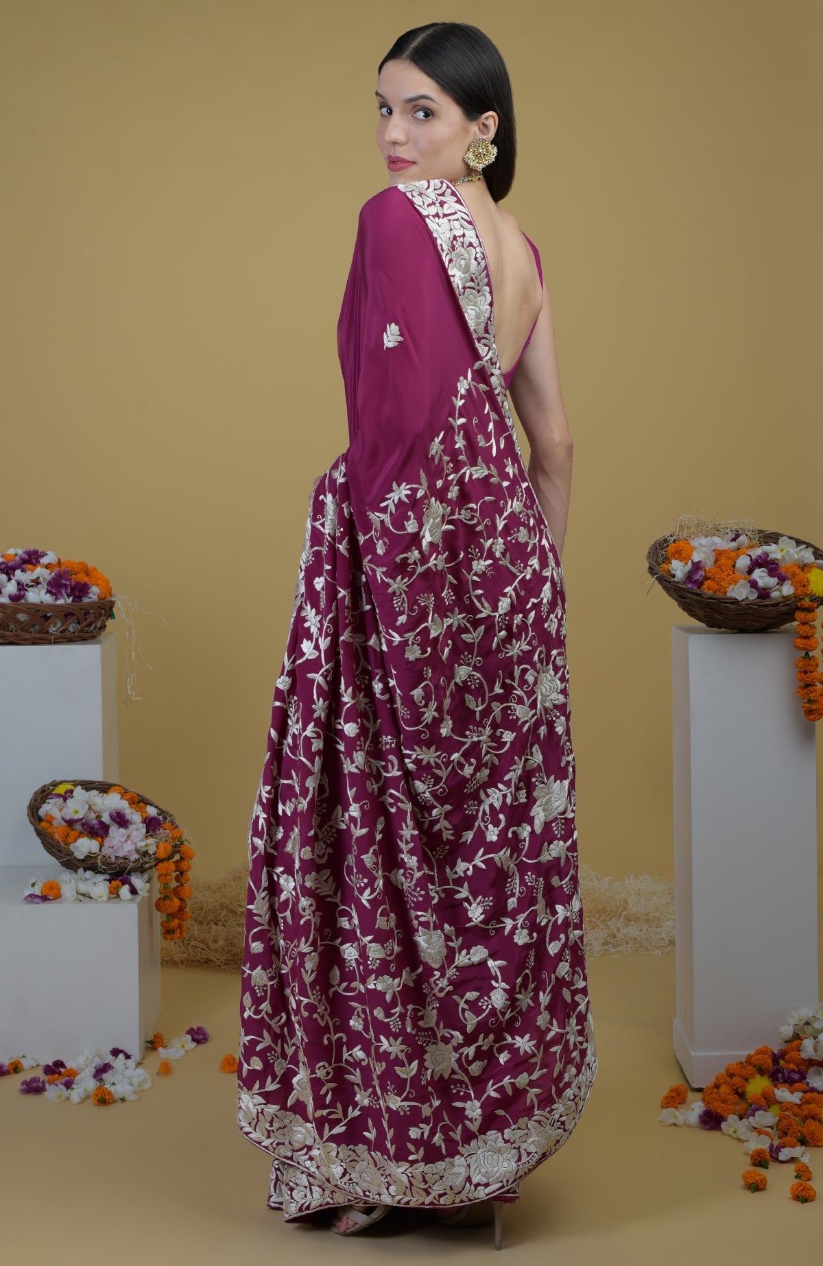 Peacock pink Parsi Gara hand embroidered saree with intricate ivory floral patterns.