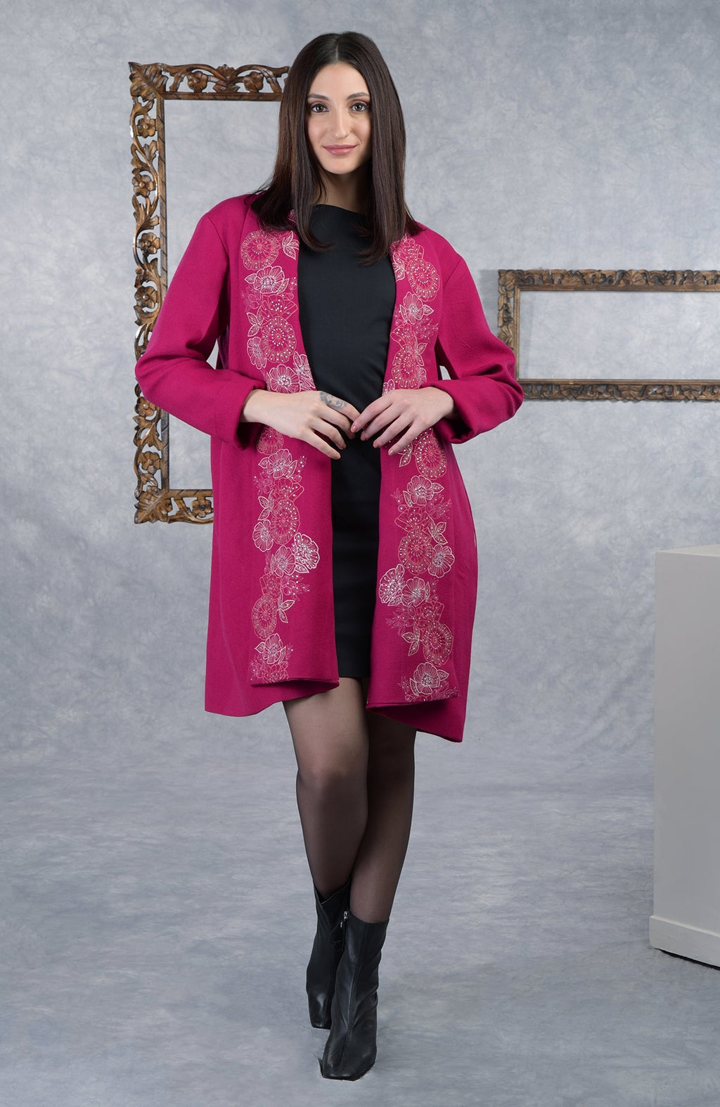 Frida fuchsia rose floral embroidered pure wool crepe jacket on a model.