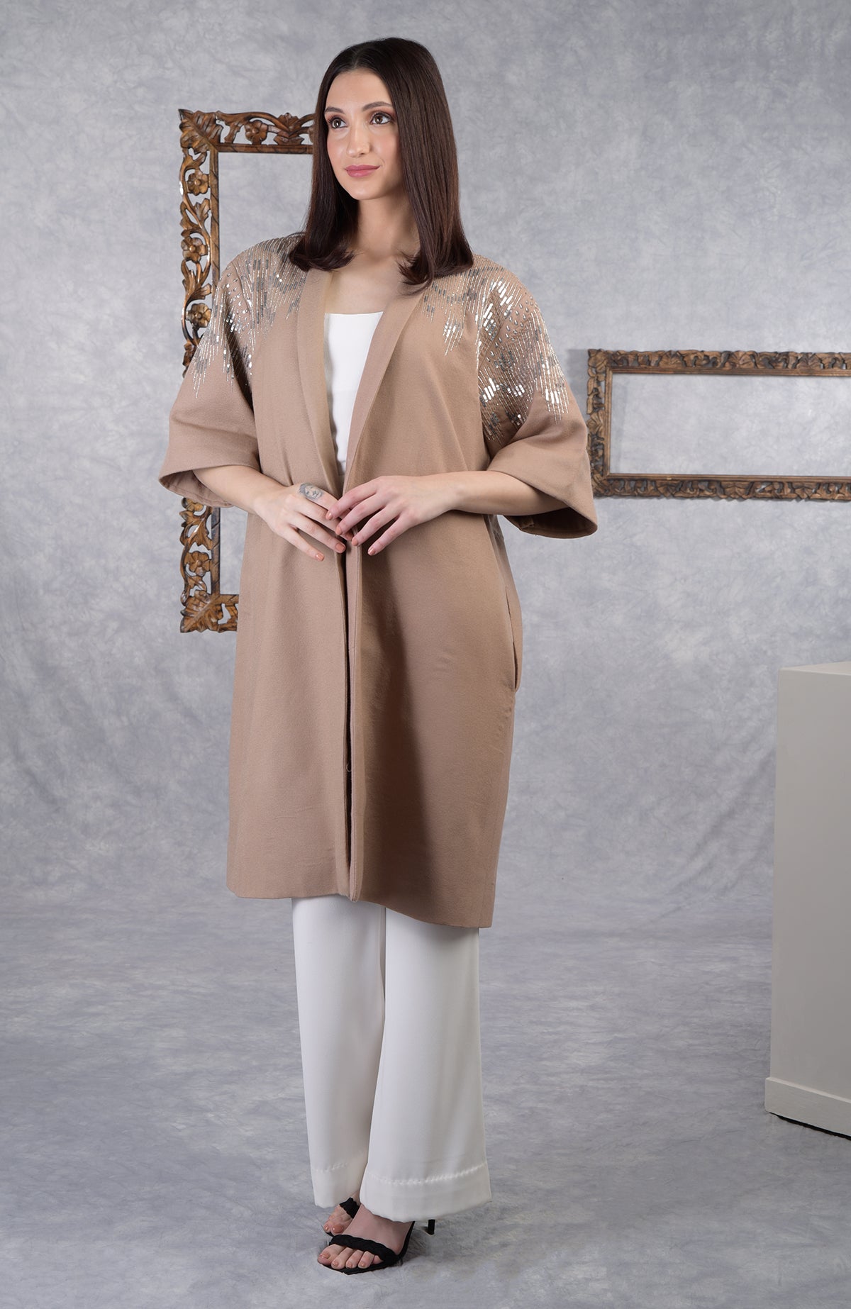 Camel beige wool crepe kimono jacket with silver sequin and cutbead embroidery on shoulders.