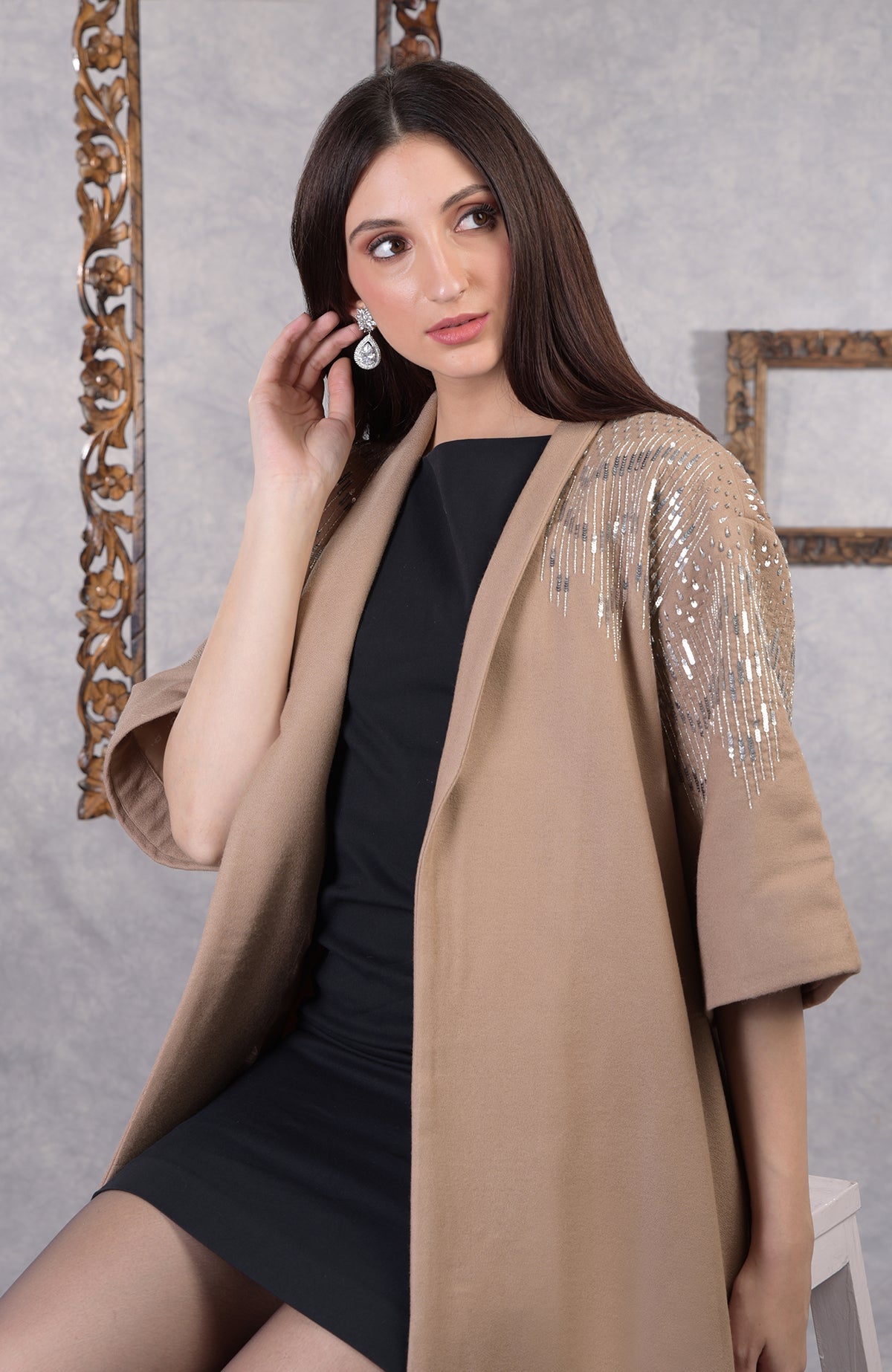 Camel beige wool crepe kimono jacket with silver sequin and cutbead embroidery on shoulders.