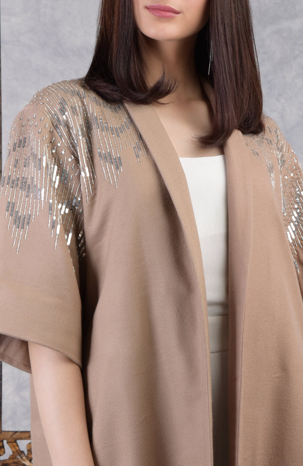 Camel beige wool crepe kimono jacket with silver sequin and cutbead embroidery on shoulders and sleeves