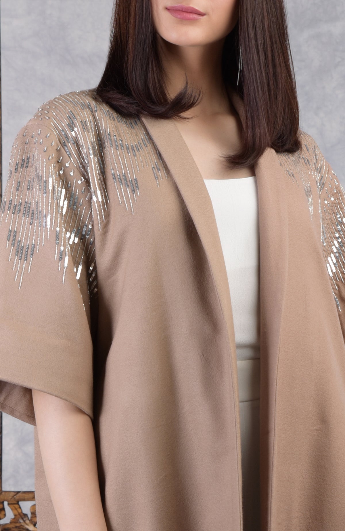 Camel beige wool crepe kimono jacket with silver sequin and cutbead embroidery on shoulders and sleeves