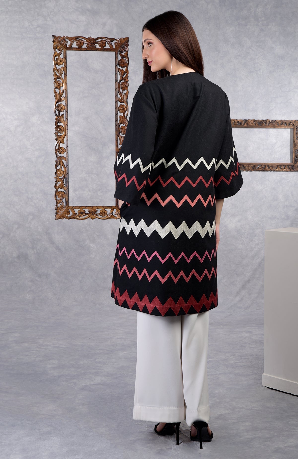 Black wool crepe kimono jacket with chevron embroidery and 3/4 bell sleeves.