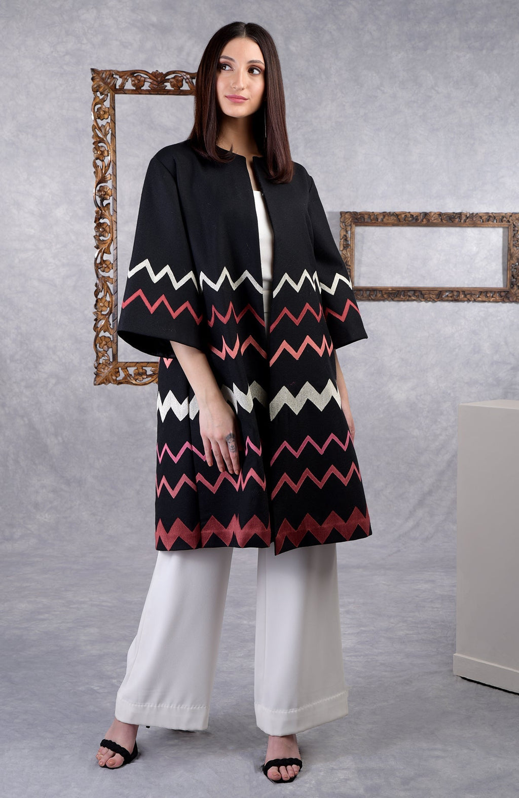 Black wool crepe kimono jacket with chevron embroidery and 3/4 bell sleeves.