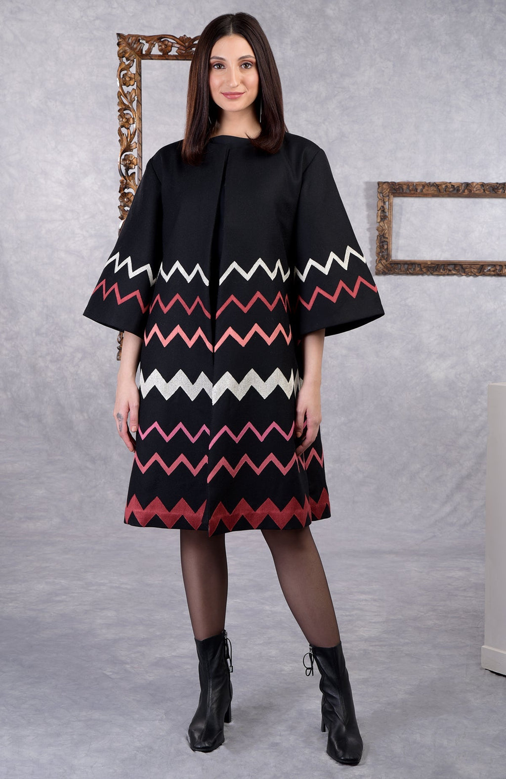 Black wool crepe kimono jacket with chevron embroidery and 3/4 bell sleeves.
