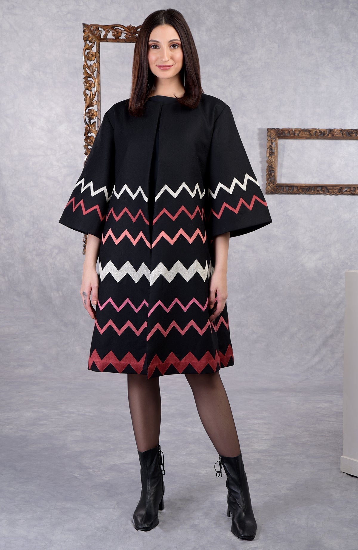 Black wool crepe kimono jacket with chevron embroidery and 3/4 bell sleeves.