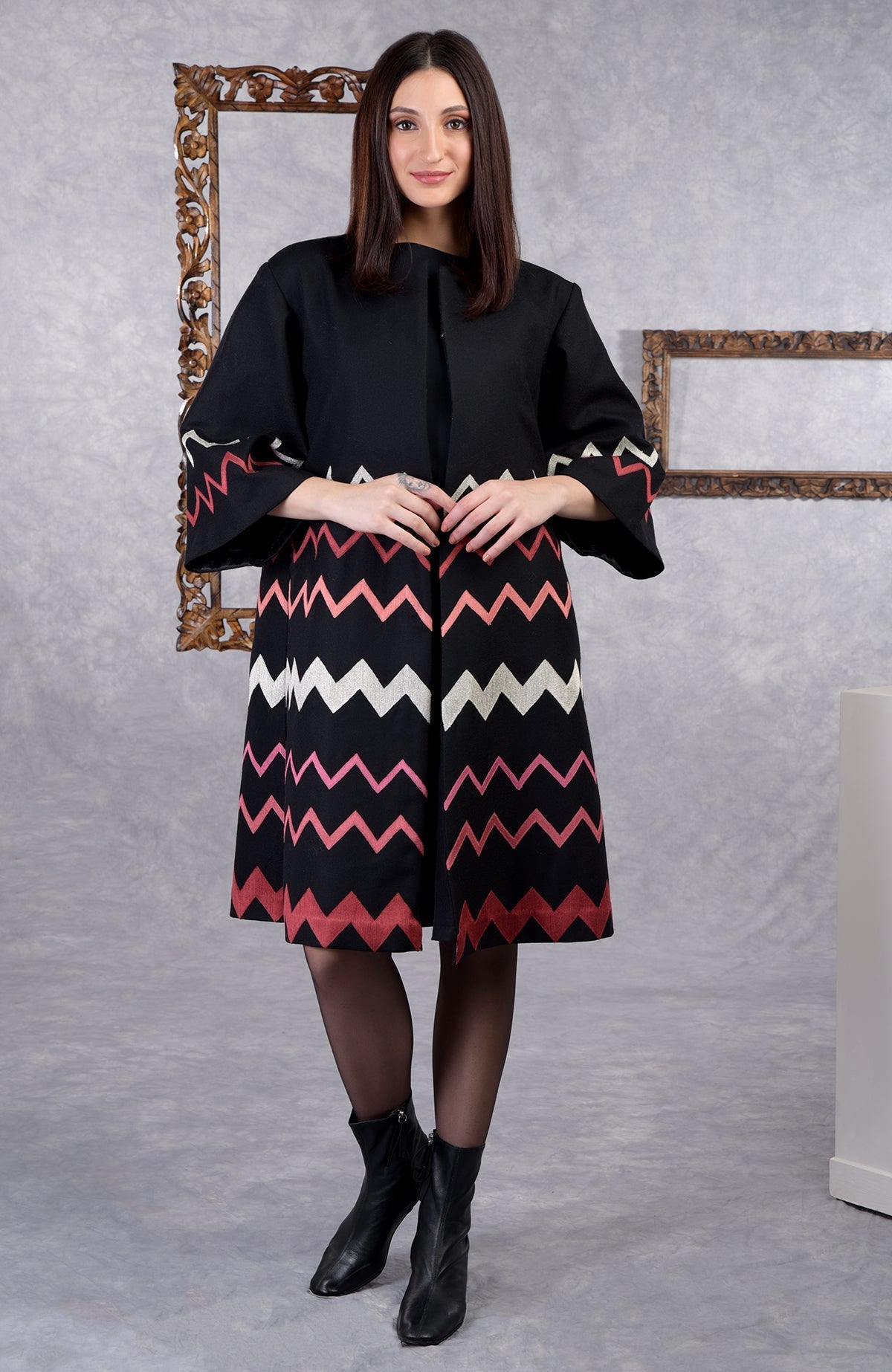 Black wool crepe kimono jacket with embroidered copper and pink chevron patterns and bell sleeves