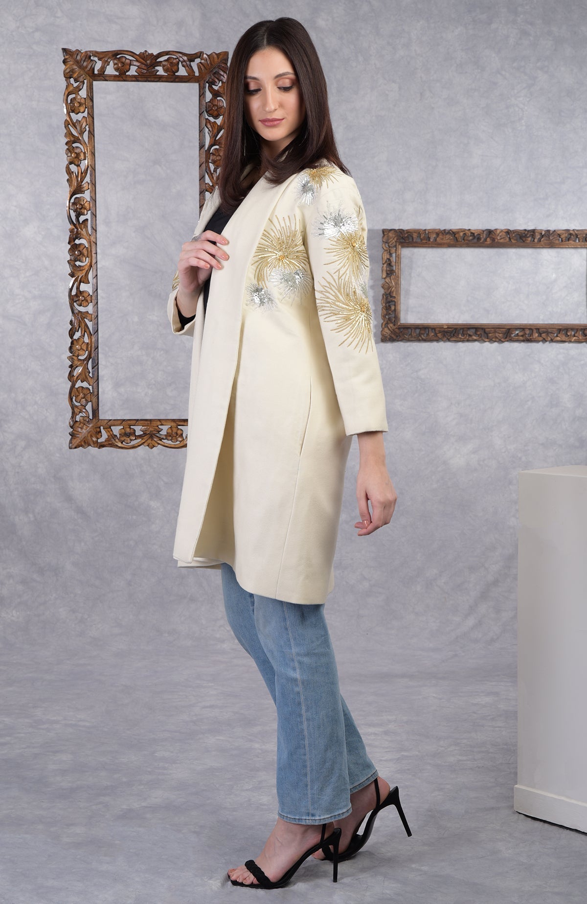Ivory wool crepe kimono jacket with gold and silver starburst embroidery and shawl collar.