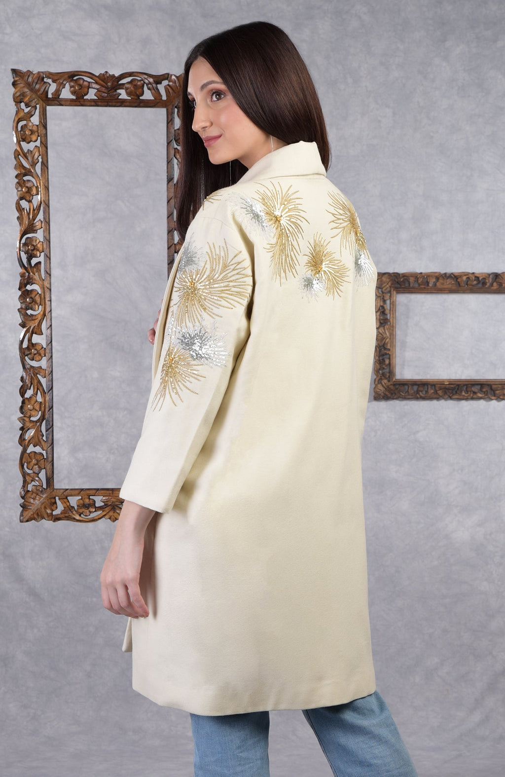 Ivory wool crepe kimono jacket with gold and silver starburst embroidery and shawl collar.