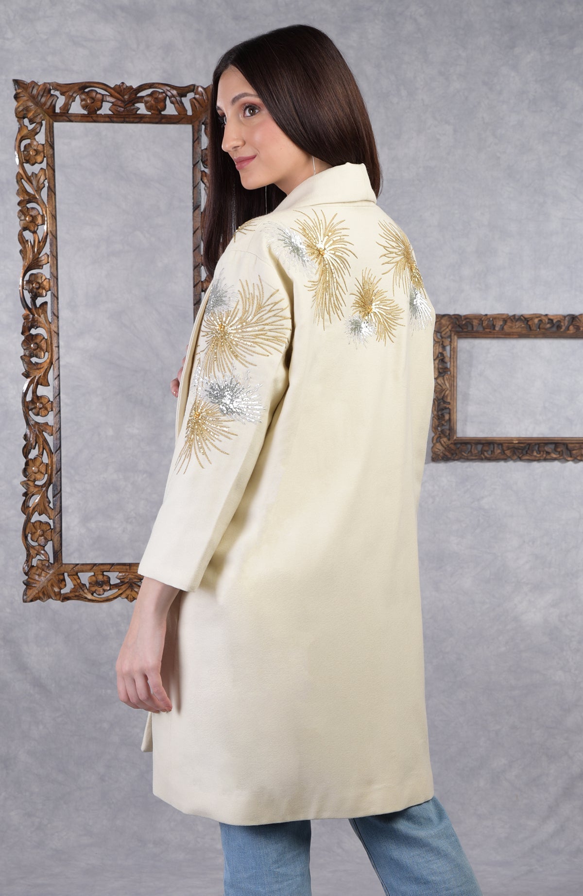 Ivory wool crepe kimono jacket with gold and silver starburst embroidery and shawl collar.