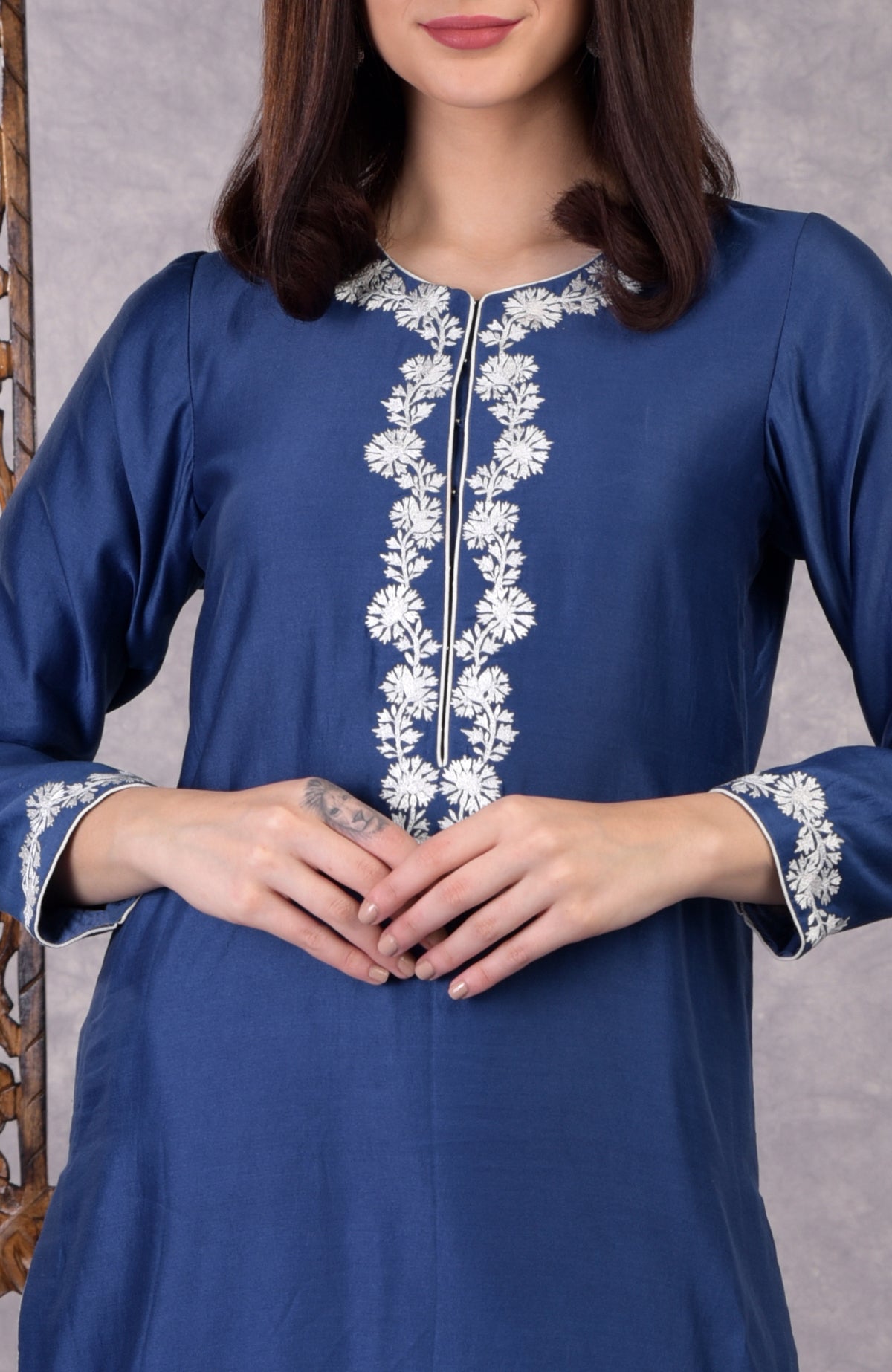 Classic blue chanderi sharara suit with white Kashmir Bagh inspired thread embroidery and dupatta.