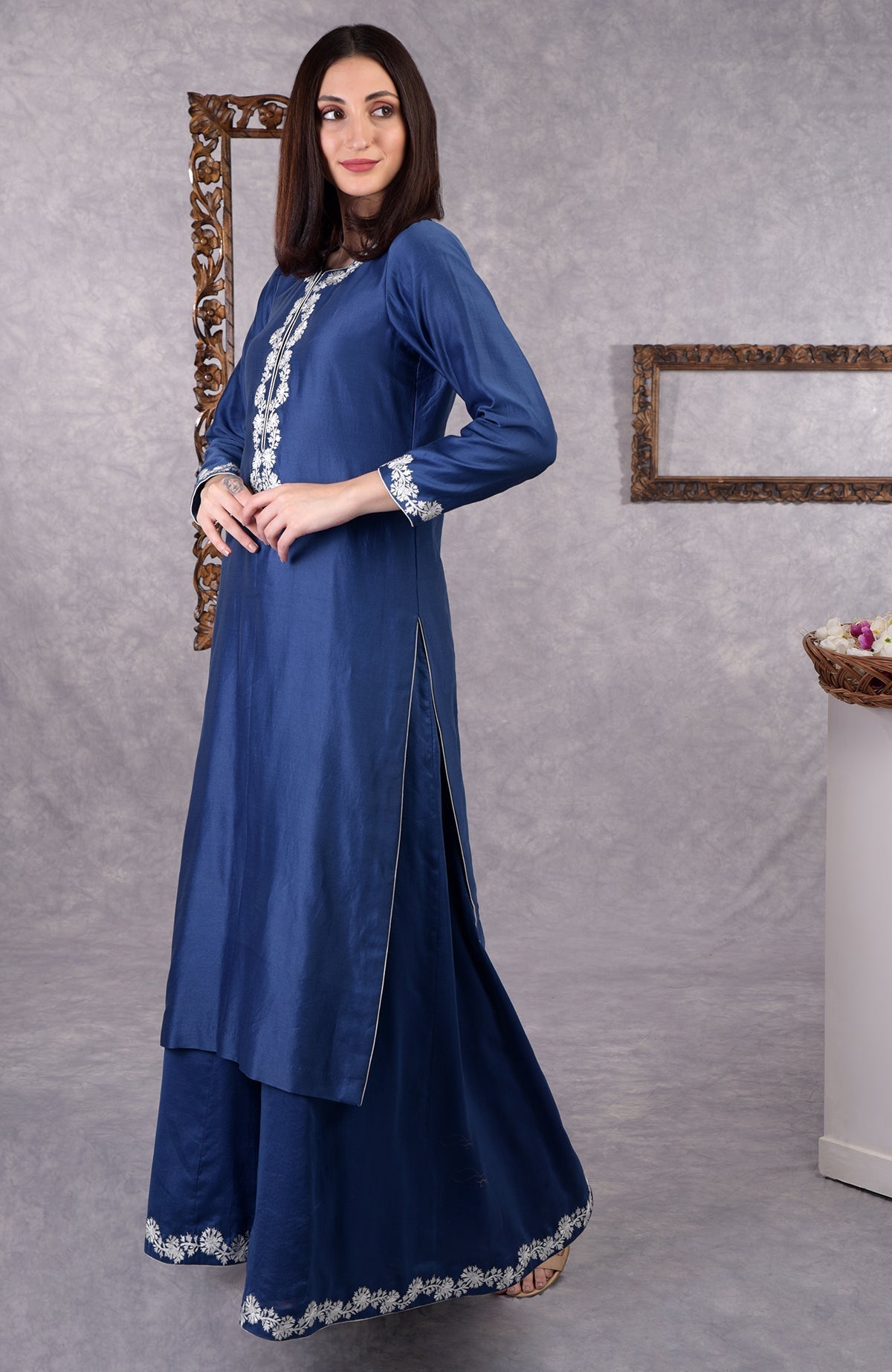 Classic blue chanderi sharara suit with white Kashmir Bagh thread embroidery and matching dupatta.