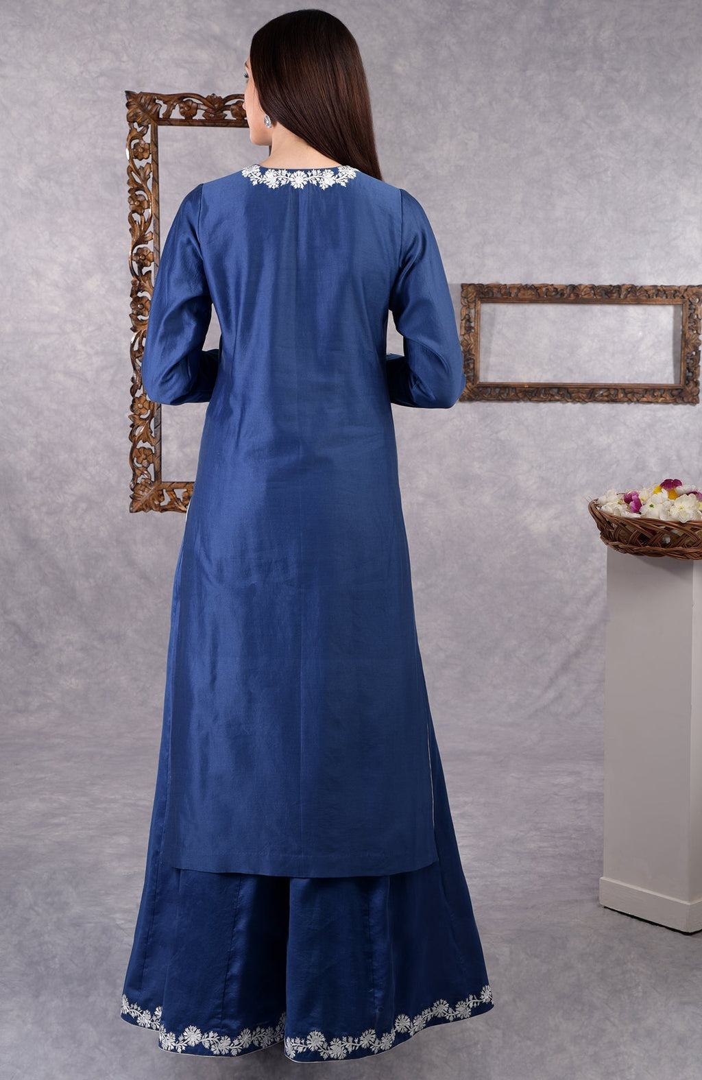 Classic blue chanderi sharara suit with white Kashmir Bagh thread embroidery and matching dupatta.