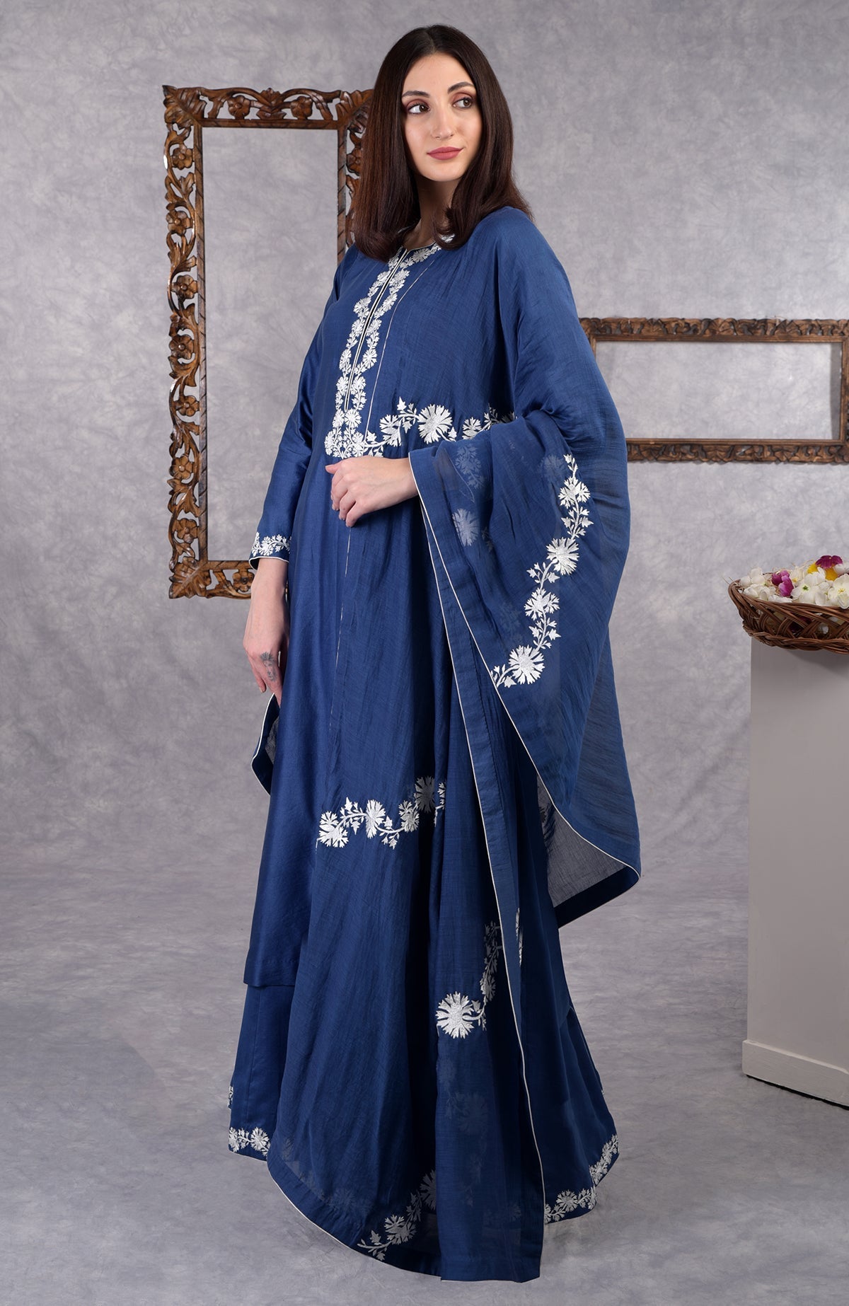Classic blue chanderi sharara suit with white Kashmir Bagh thread embroidery and matching dupatta.