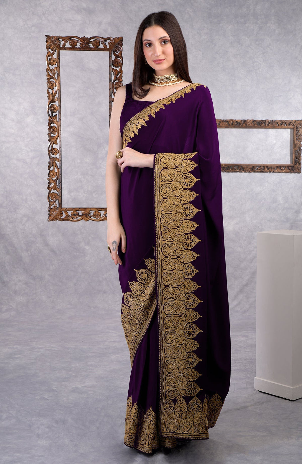 Dark plum crepe saree with gold Kashmiri tilla aari floral and paisley embroidery border