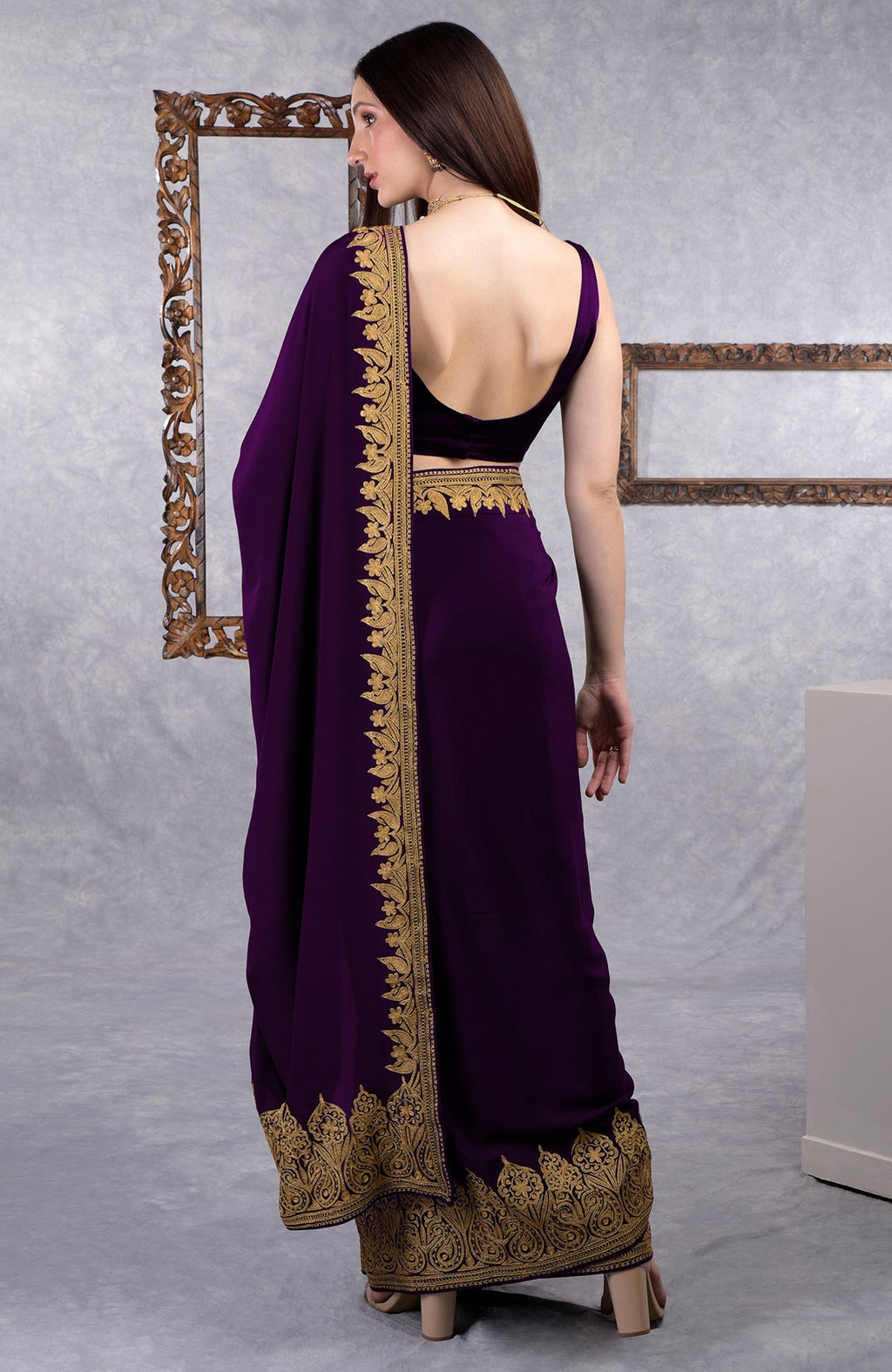 Dark plum crepe saree with gold Kashmiri tilla aari floral and paisley embroidery border