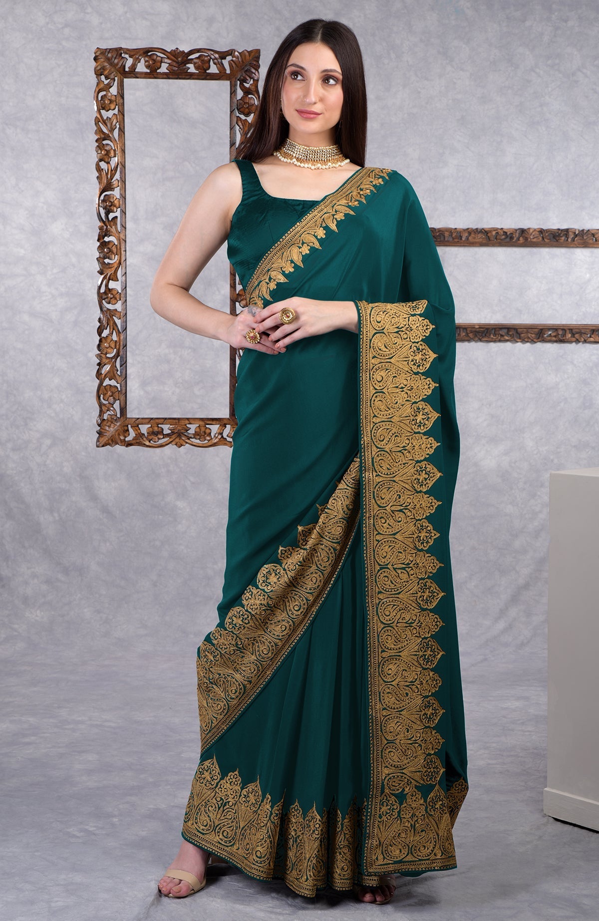 Black crepe saree with gold Kashmiri tilla aari floral and paisley embroidery border