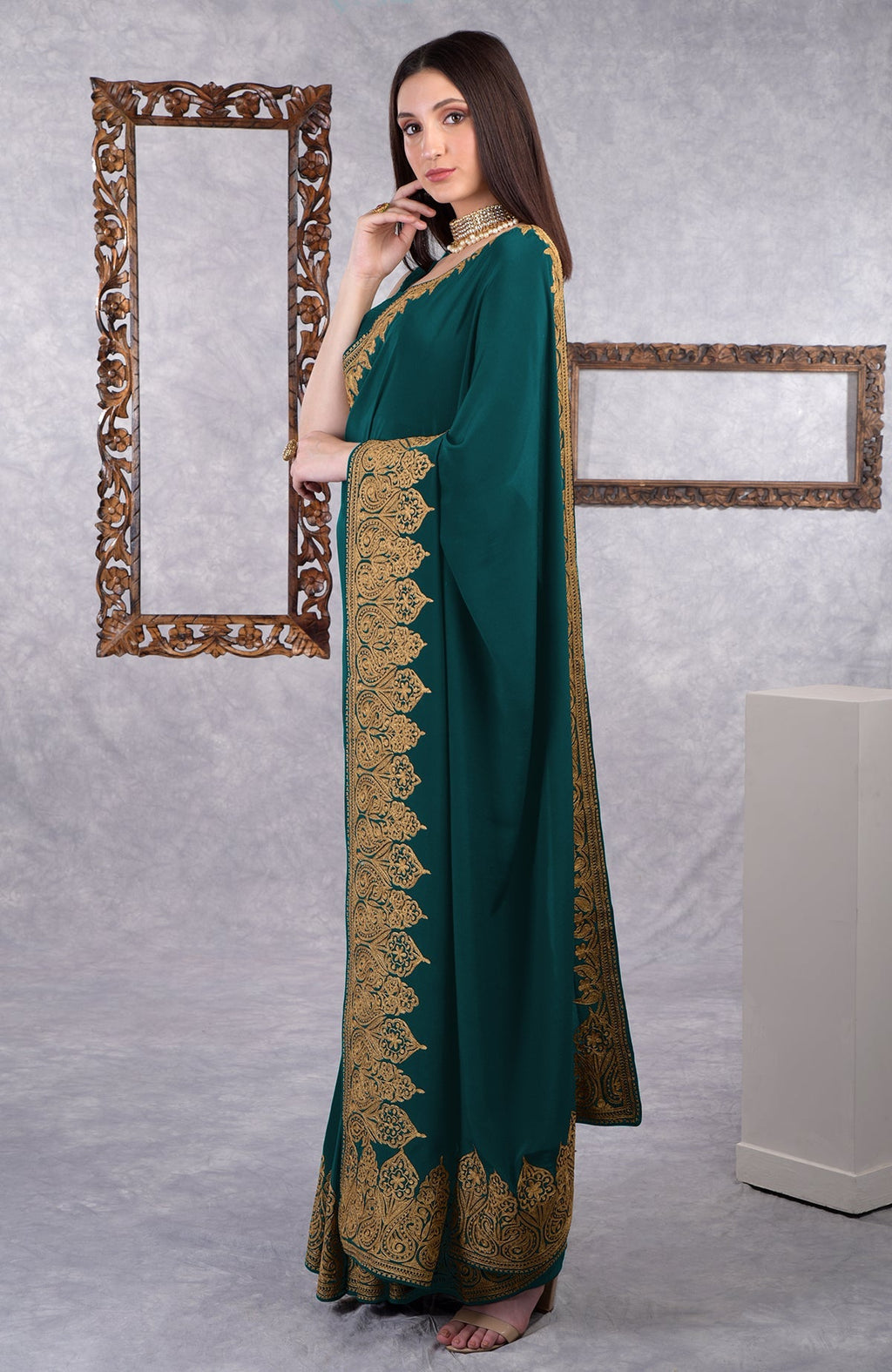 Teal crepe saree with gold Kashmiri tilla aari floral and paisley embroidery border
