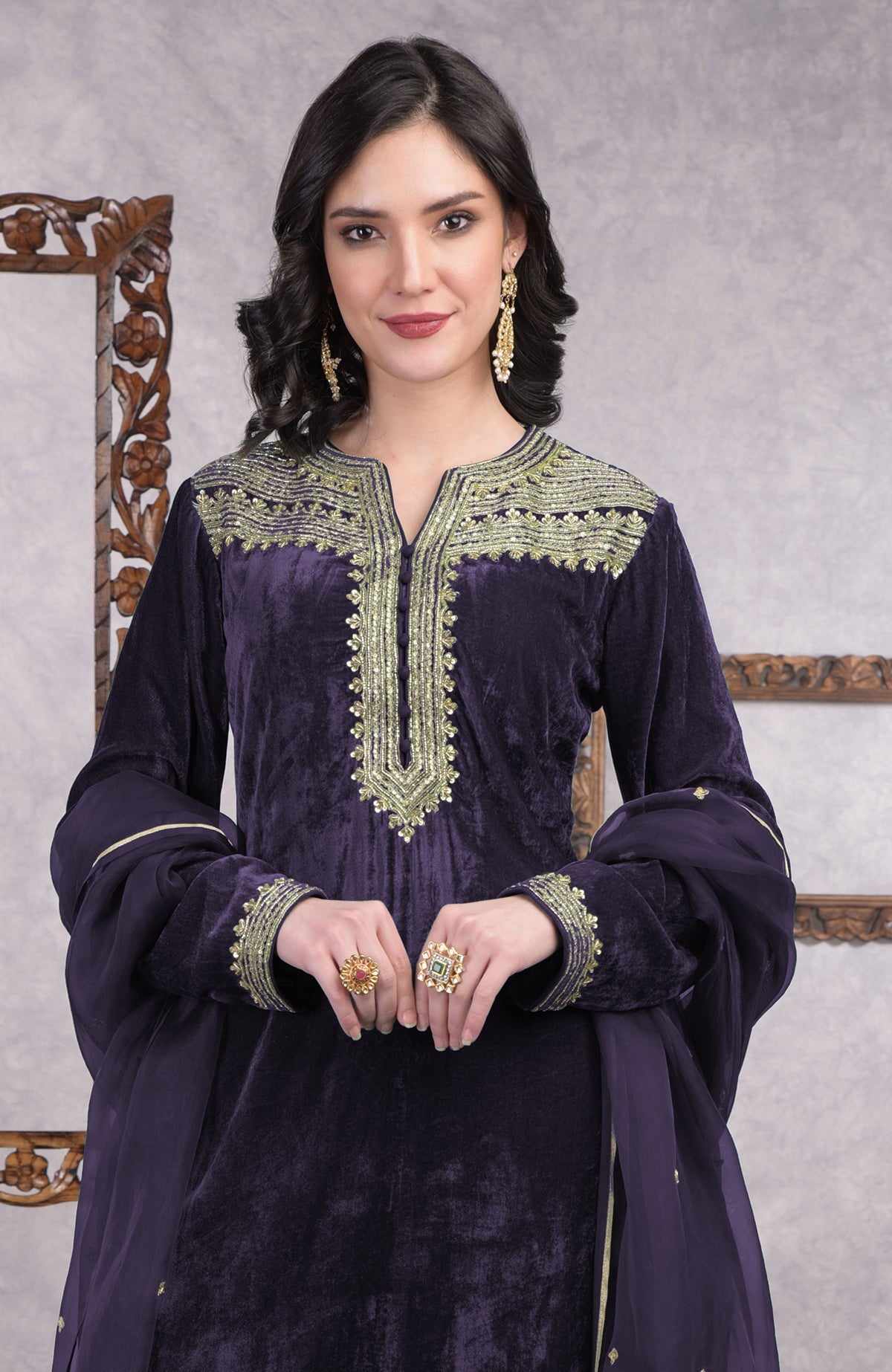 Eclipse blue velvet kurta set with gold zardozi embroidery and matching churidar pants.