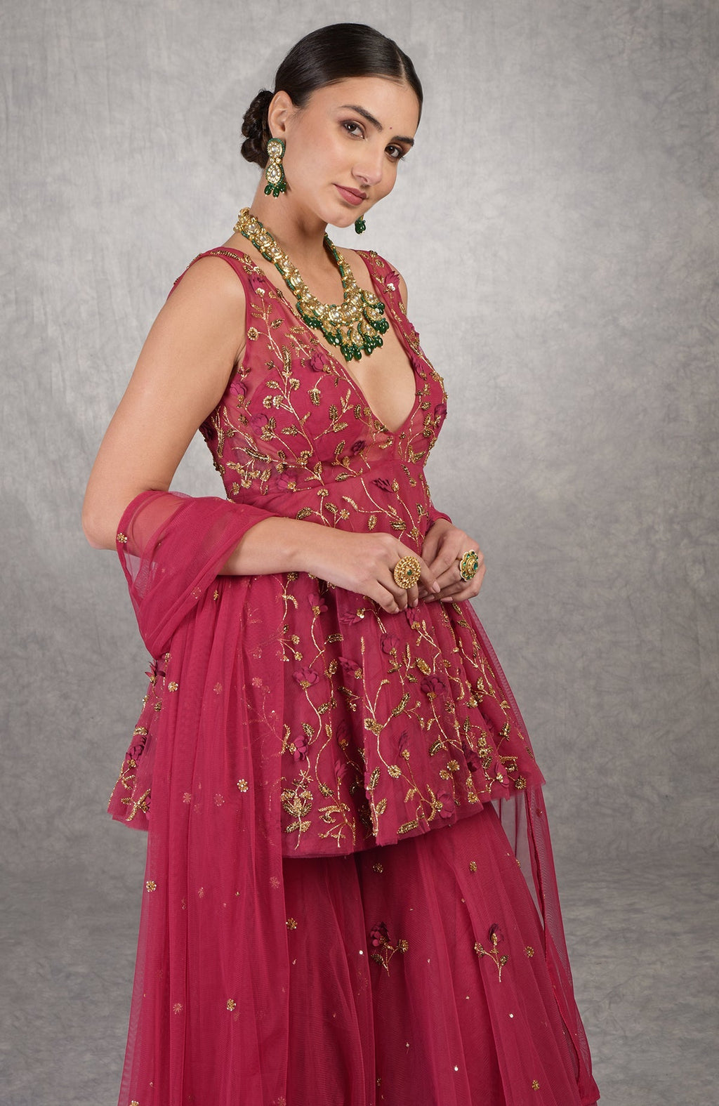 Red sharara set with 3D floral and zardozi hand embroidery on soft tulle fabric.